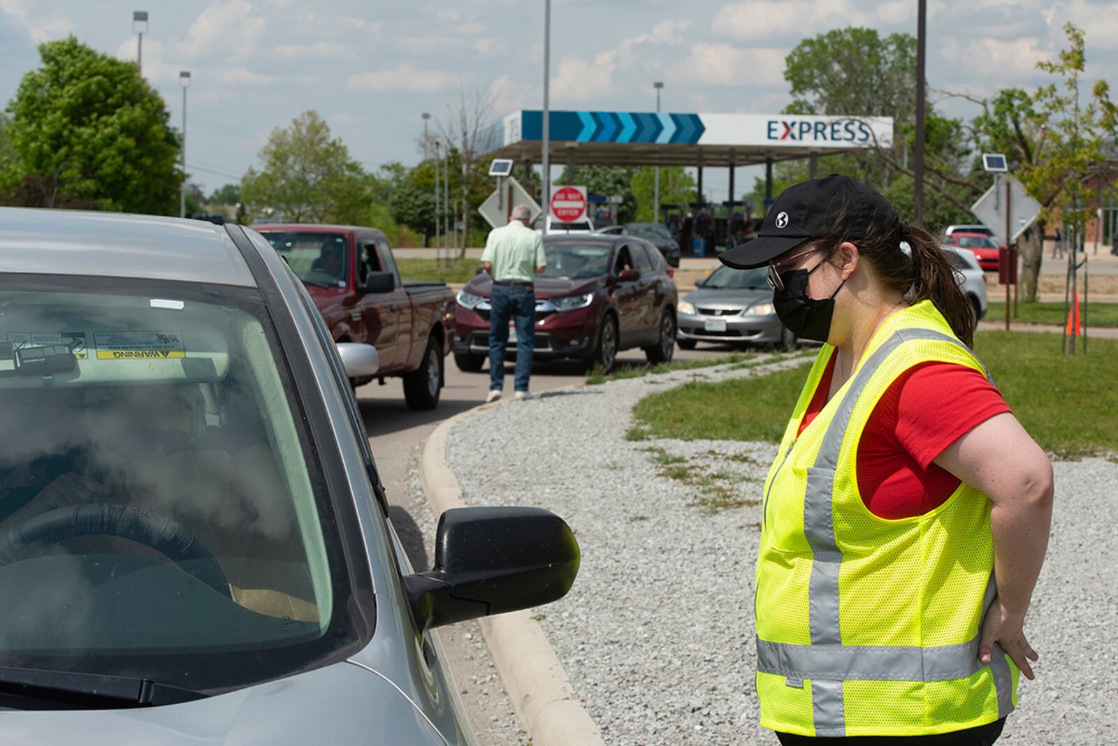 Angela Minear helps a customer in the drive-thru line May 19 at Kittyhawk Pharmacy on Wright-Patterson Air Force Base. U.S. AIR FORCE PHOTO/R.J. ORIEZ