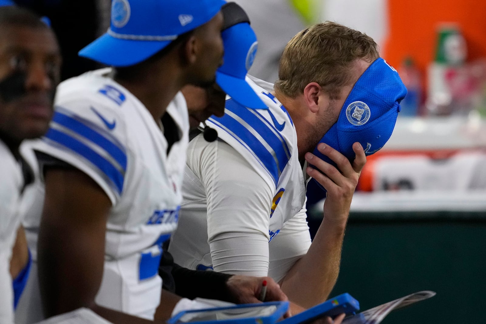 Detroit Lions quarterback Jared Goff reacts on the bench after throwing an interception during the second half of an NFL football game against the Houston Texans, Sunday, Nov. 10, 2024, in Houston. (AP Photo/David J. Phillip)