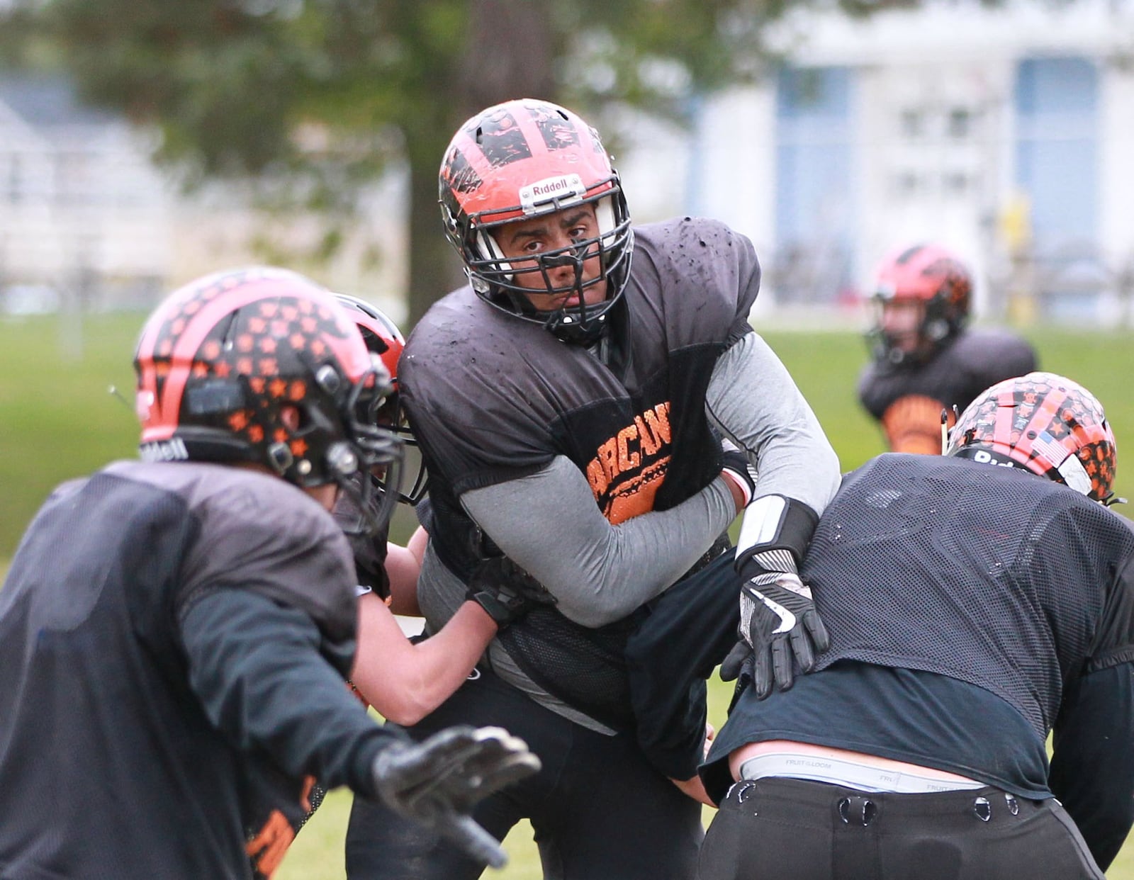 Arcanum senior lineman Jayden Heltsley if 6-4, 280 pounds. The Trojans prepare for a Week 8 high school football CCC showdown against Covington during practice on Wednesday, Oct. 16, 2019. MARC PENDLETON / STAFF