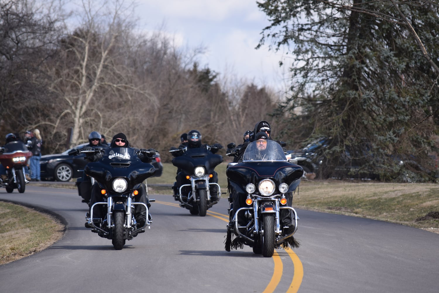 PHOTOS: Thousands of Outlaws attend motorcycle gang leaders funeral at Montgomery County Fairgrounds.