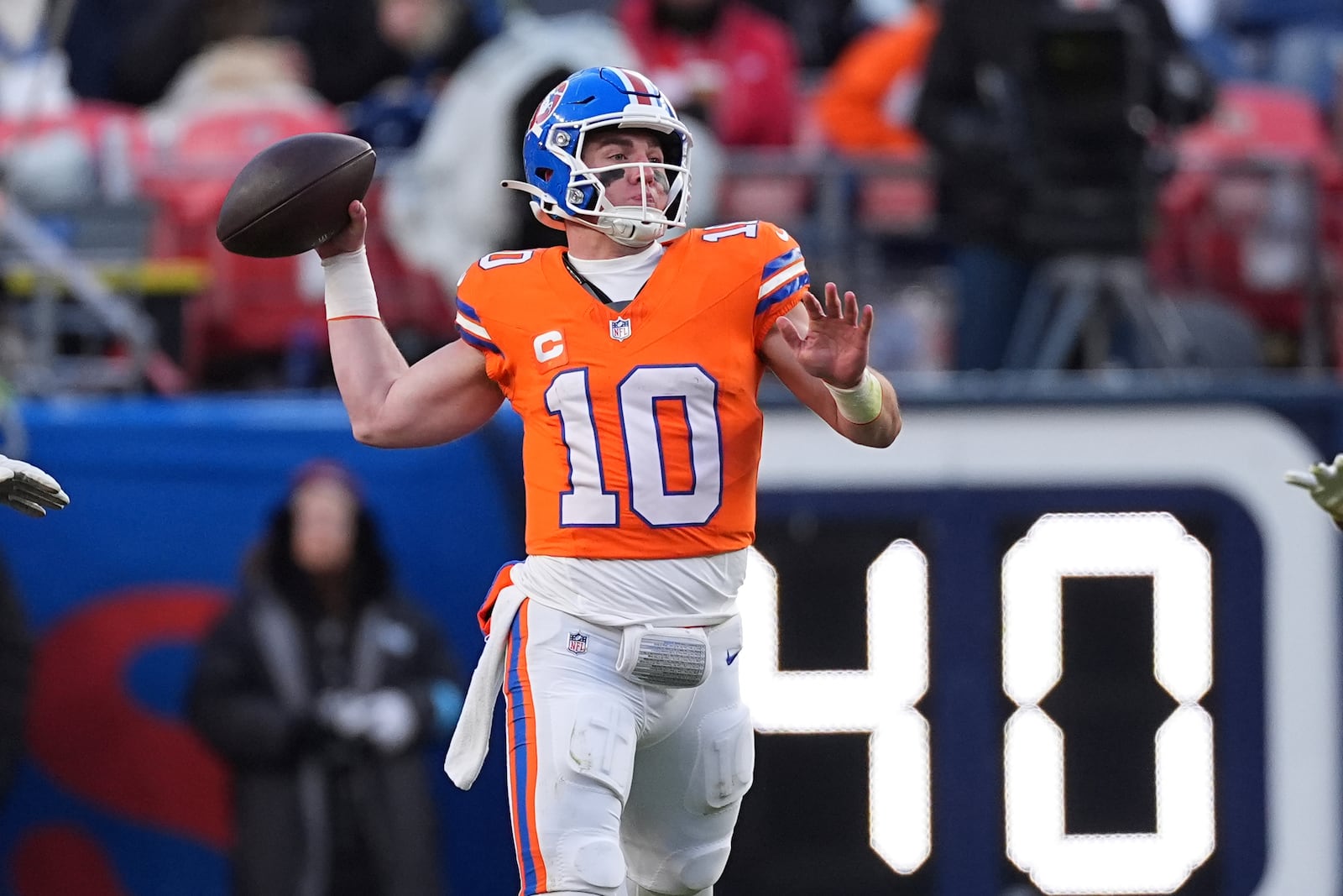 Denver Broncos quarterback Bo Nix (10) throws during the second half of an NFL football game against the Kansas City Chiefs Sunday, Jan. 5, 2025, in Denver. (AP Photo/David Zalubowski)