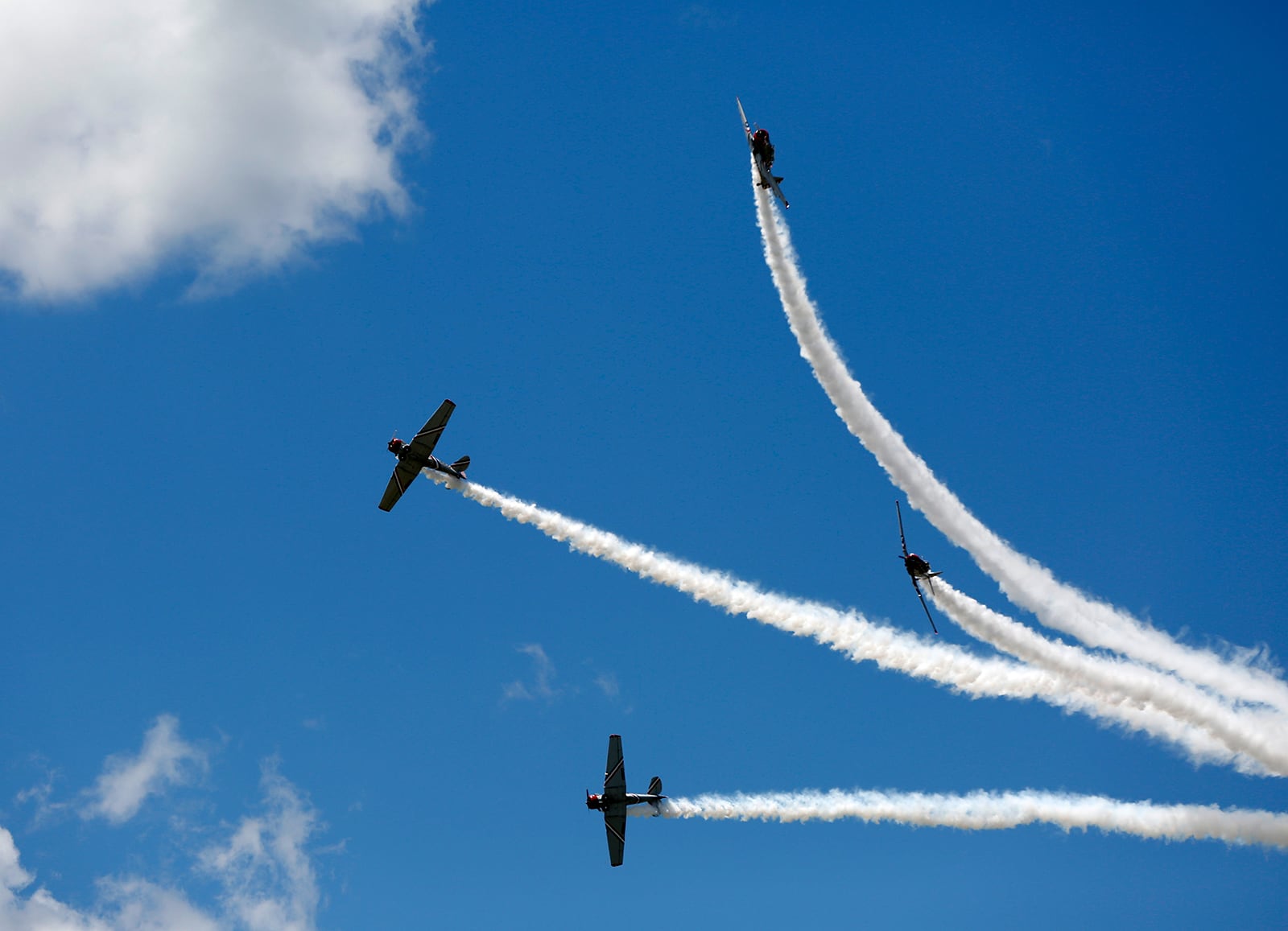 The Geico Skytypers perform aerial maneuvers at the Vectren Dayton Air Show Sunday. LISA POWELL / STAFF