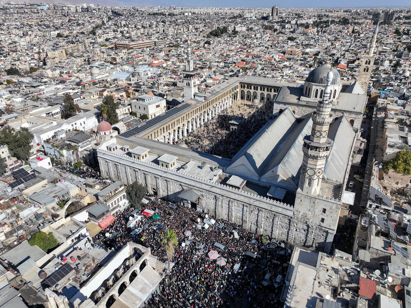 Syrians gather at the Umayyad mosque to attend first Friday prayers since Bashar Assad's ouster, in Damascus, Syria, Friday, Dec. 13, 2024. (AP Photo/Ghaith Alsayed)