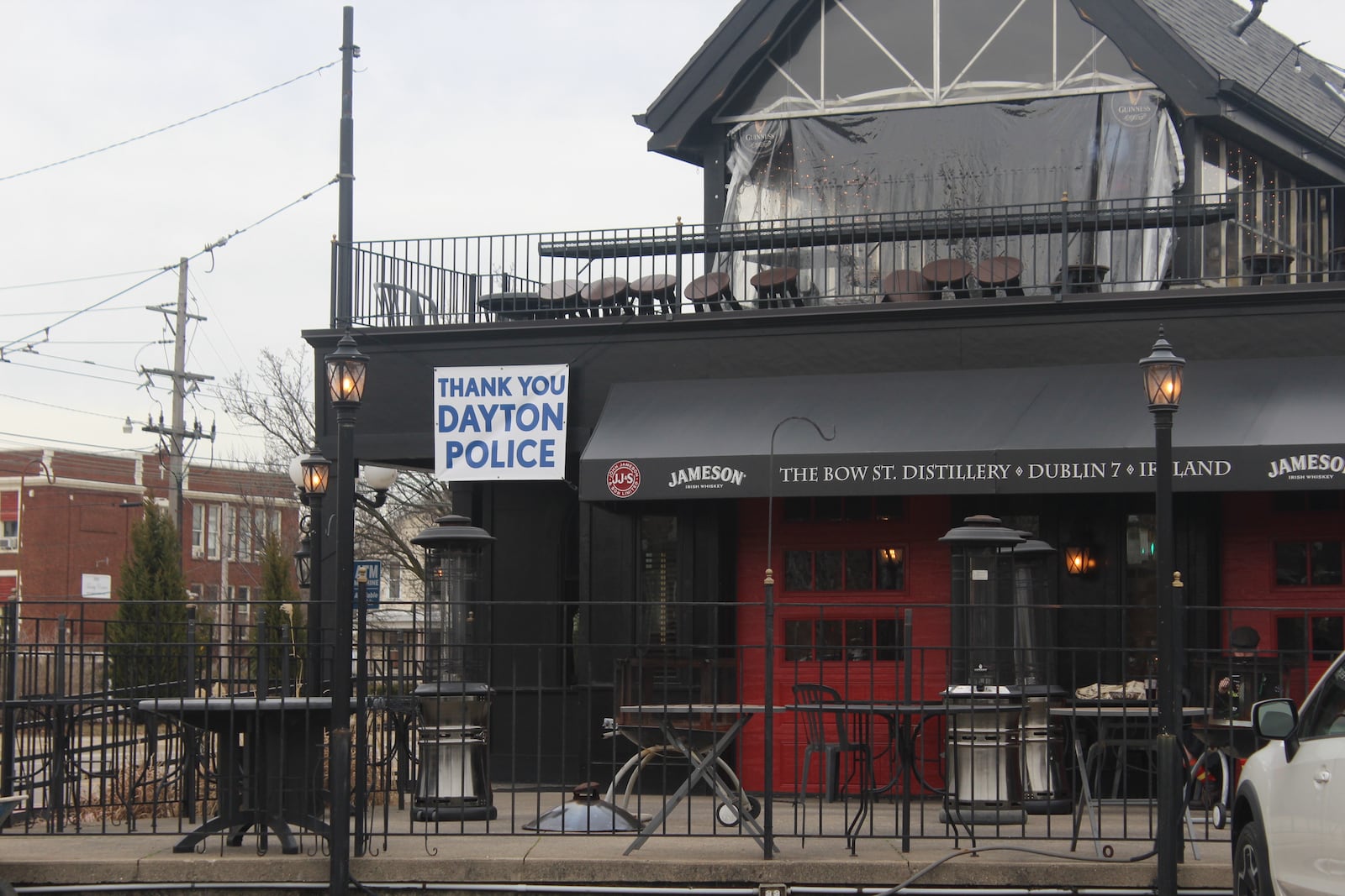 Six months after a 24-year-old Bellbrook man killed nine people in the Oregon District during the worst mass shooting in Ohio history, literal signs of strength, appreciation, resilience and the determination to “do something” about gun violence can be found throughout the historic neighborhood. Several "Thank You Dayton Police" signs hang at The Dublin Pub. AMELIA ROBINSON/STAFF