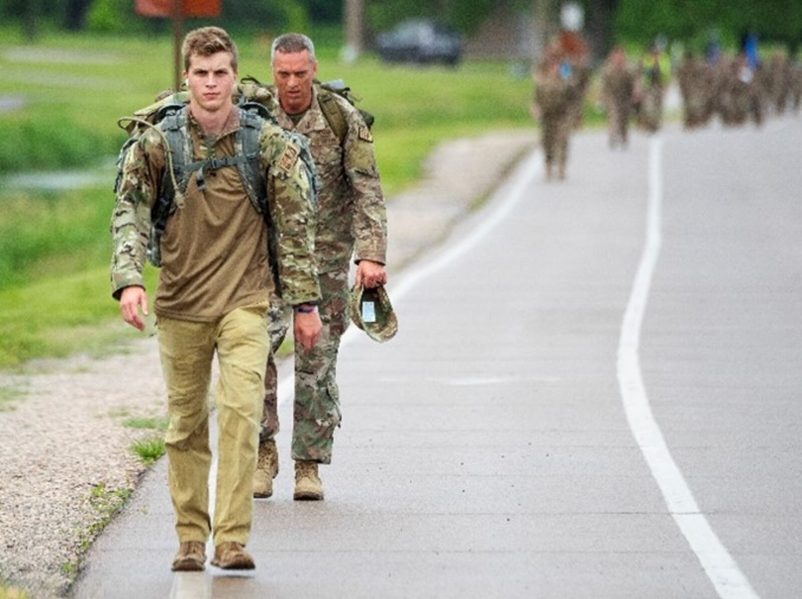 Army Pfc. Jacob Hobbs and Air Force Chief 
Master Sgt. Justin Walker, 88th Security 
Forces Squadron, participate in the 
squadron’s Ruck to Remember May 20 at Wright-Patterson Air Force Base. The 3-mile march was in honor of Air 
Force Defenders who died in the line of duty 
and marked the end of National Police Week. 
U.S. Air Force photo/R.J. Oriez FOR MORE POLICE WEEK COVERAGE, SEE PAGE 3
