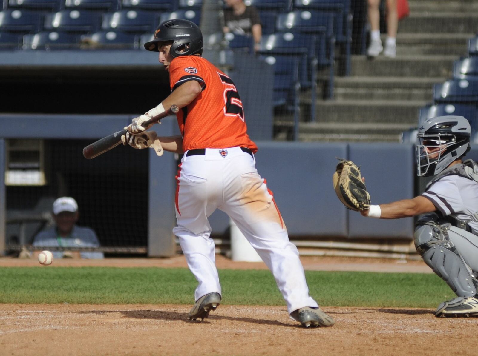 Coldwater’s Austin Riethman bunts. Coldwater played Cincinnati Roger Bacon in a high school baseball D-II state semifinal at Canal Park in Akron on Saturday, June 8, 2019. MARC PENDLETON / STAFF