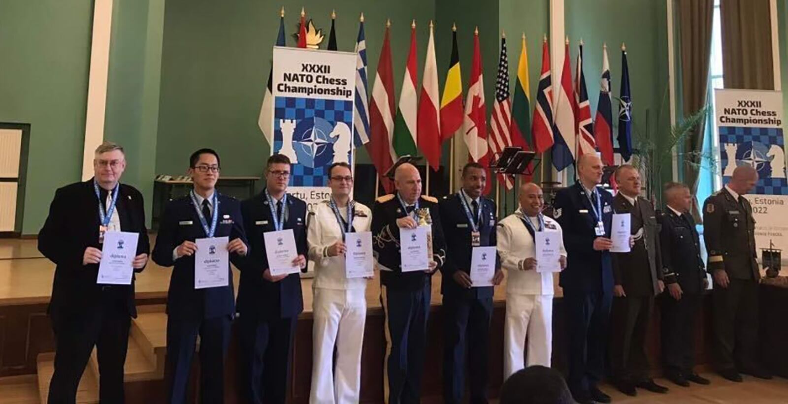 U.S national chess team players display their third-place medals from the NATO Chess Championship on July 1 in Tartu, Estonia. Team USA is comprised of four Airmen and two sailors. CONTRIBUTED PHOTO