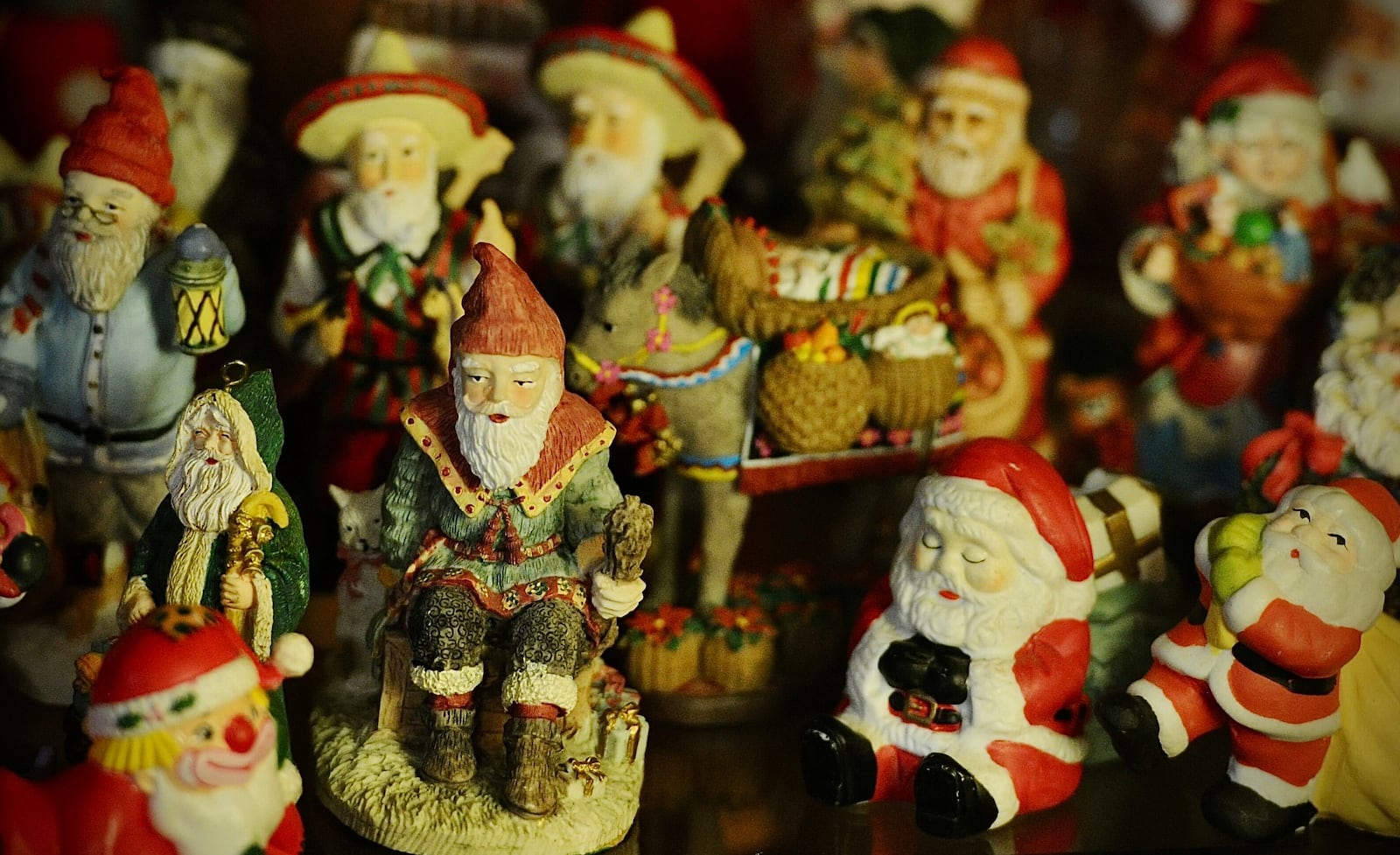 Michael Roediger, director of the Dayton Art Institute, collects Santa figures and has a collection of 500 of them. MARSHALL GORBY\STAFF