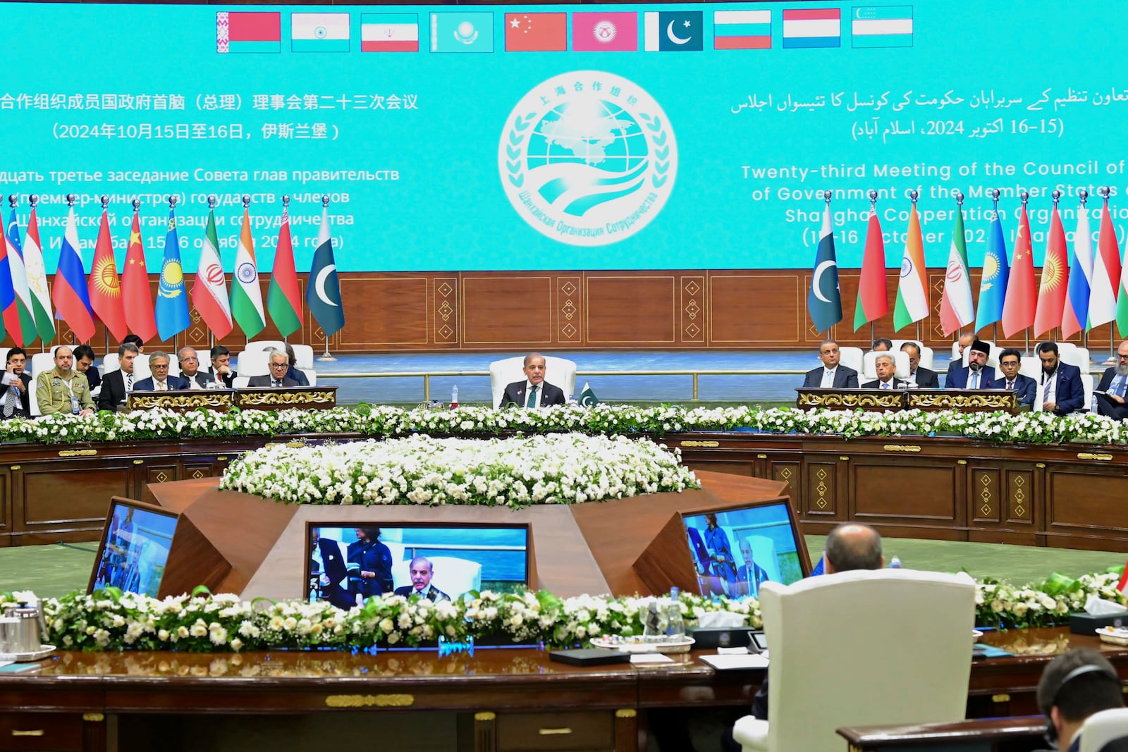 In this photo released by the Press Information Department, Pakistan's Prime Minister Shehbaz Sharif, center, delivers his speech at the opening session of Shanghai Cooperation Organization (SCO) meeting, in Islamabad, Pakistan, Wednesday, Oct. 16, 2024. (Press Information Department via AP)