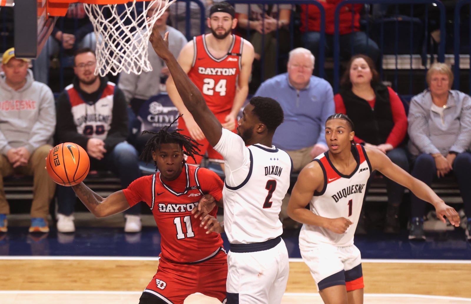 Dayton's Malachi Smith makes a pass against Duquesne on Tuesday, Jan. 21, 2025, at the UPMC Cooper Fieldhouse in Pittsburgh. David Jablonski/Staff