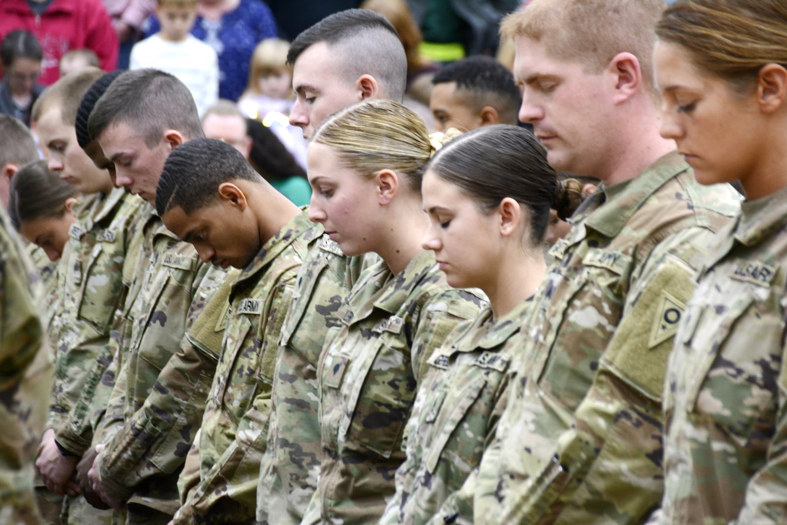 Hundreds of family and friends watched their loved ones during a call of duty ceremony Sunday afternoon, Dec. 8, 2019, at Edgewood Middle School on Trenton-Oxford Road. The soldiers of the 324th Military Police Co. in Middletown will serve a year-long deployment in support of the U.S. Southern Command operations. MICHAEL D. PITMAN/STAFF