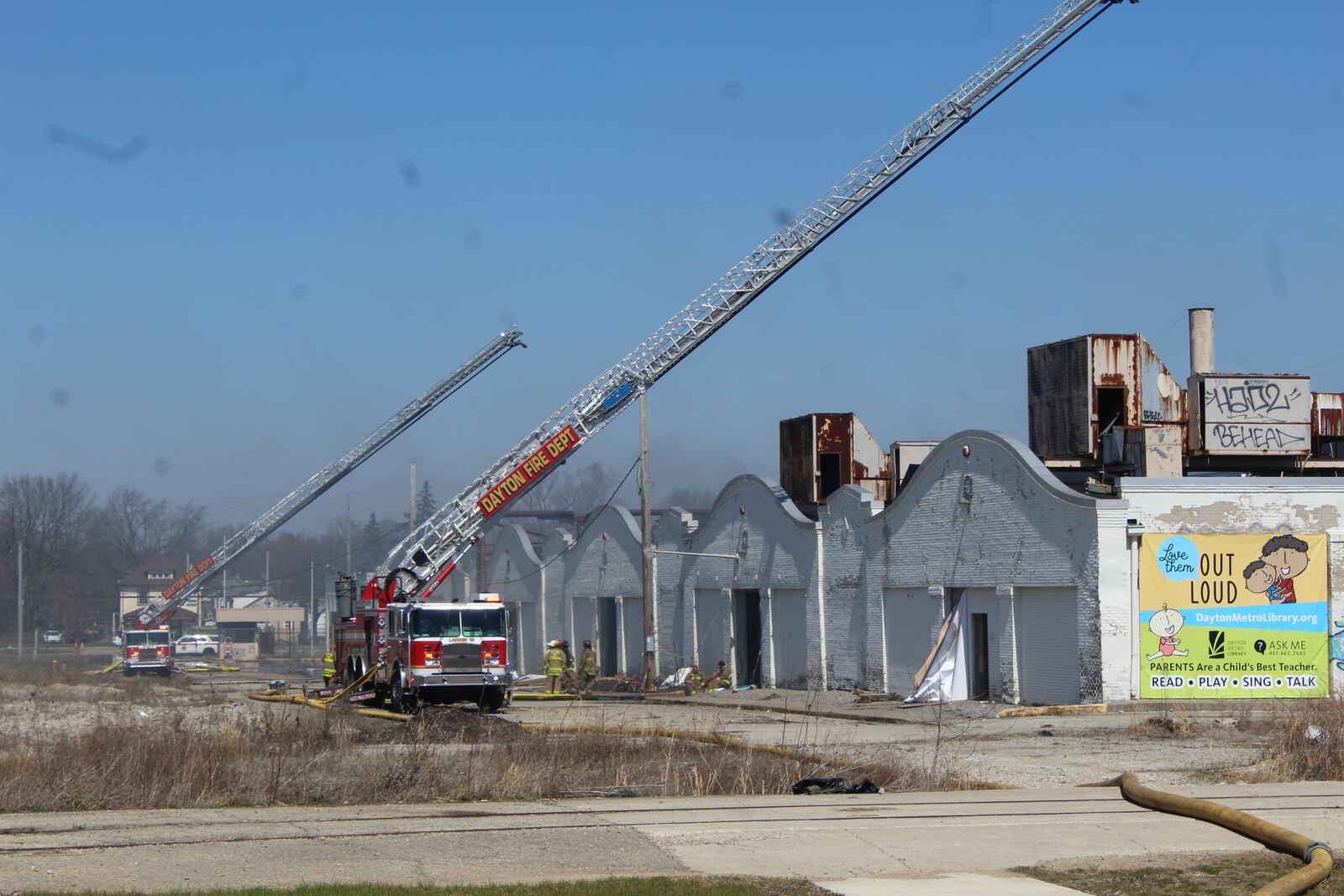 Dayton firefighters at the scene of a fire at the historic Wright brothers factory site in West Dayton on Sunday, March 26, 2023. CORNELIUS FROLIK / STAFF