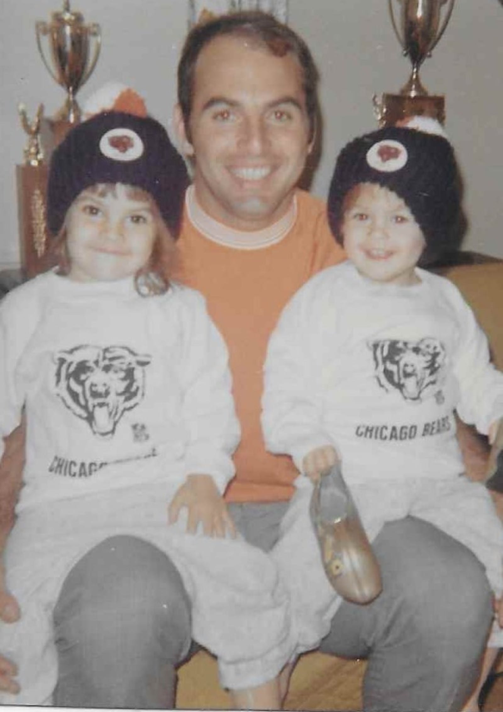 Brian Piccolo with his two oldest of his three daughters: Lori (left) and Traci, who is now Traci Piccolo Dolby, the mother of Dayton Flyers walk-on receiver Brian Dolby, a transfer from Colorado State. Piccolo, the Chicago Bears starting fullback, died of cancer in 1970 at age 26. CONTRIBUTED