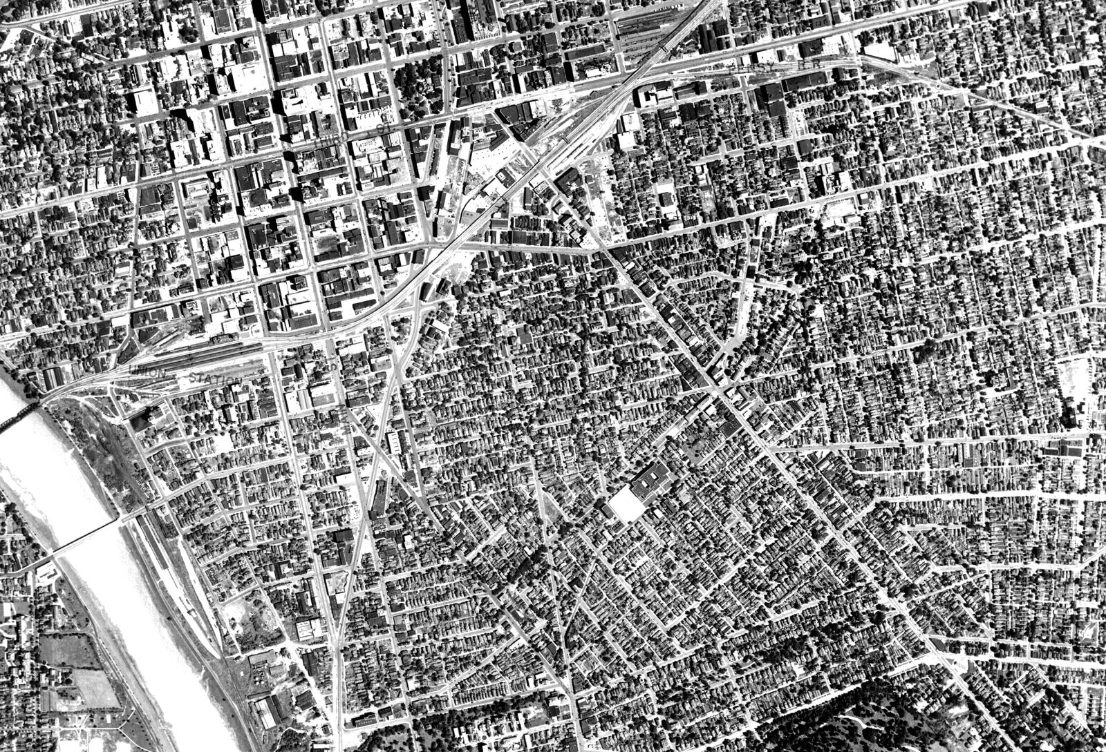 This is a 1938 aerial showing the city center before US35 and other Dayton urban renewal projects. You can clearly see Wayne Avenue cutting diagonally to the southeast (Emerson School is also a prominent landmark in the lower middle of the image). (CONTRIBUTED)