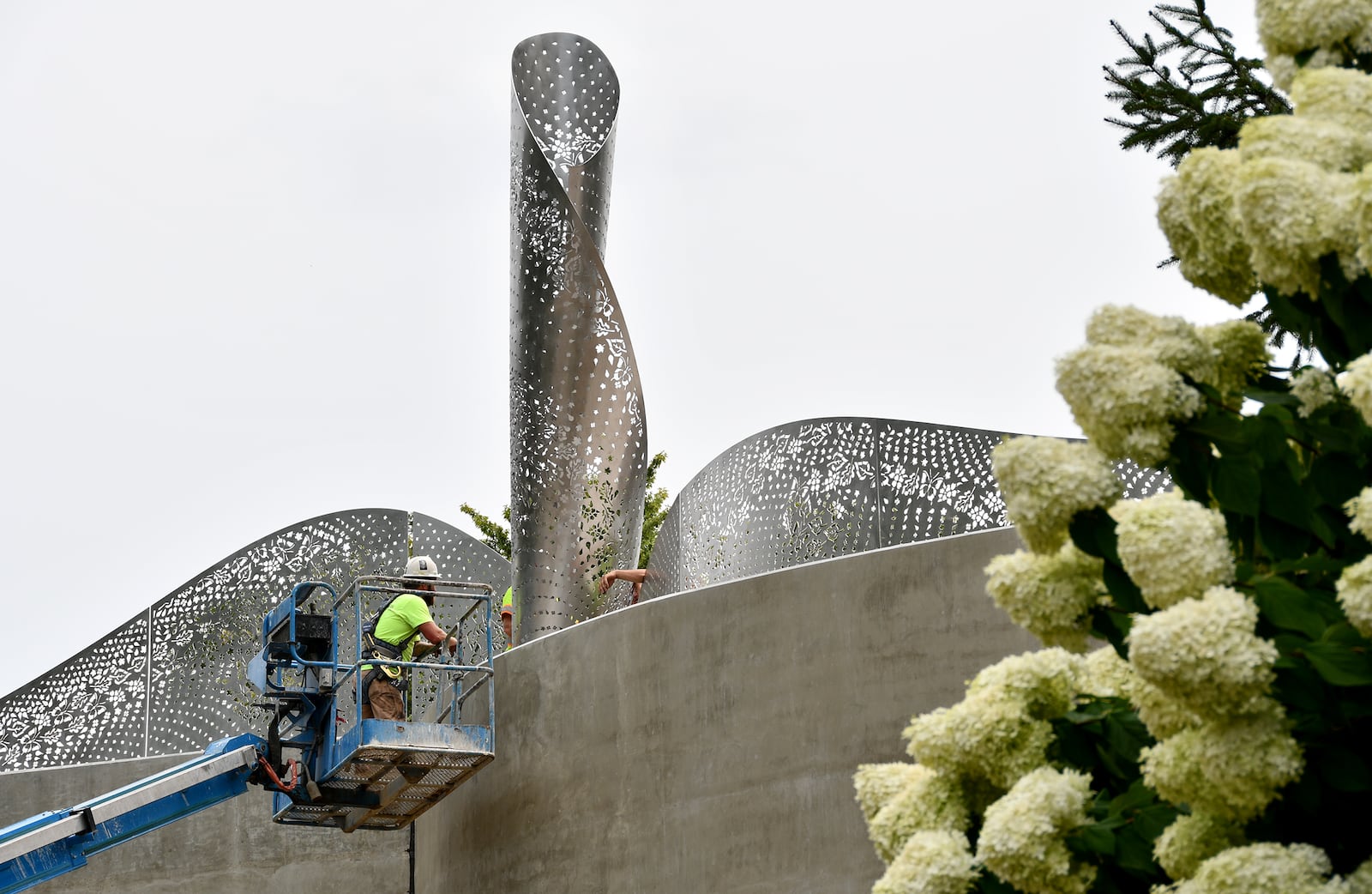 “Foliage,” a new Kettering public artwork, has been installed on the Ridgeway Road bridge. The stainless steel sculpture designed by Cliff Garten Studio in Venice, CA, mimics the landscape found within Hills & Dales MetroPark and Kettering. SHAYNA MCCONVILLE / CITY OF KETTERING