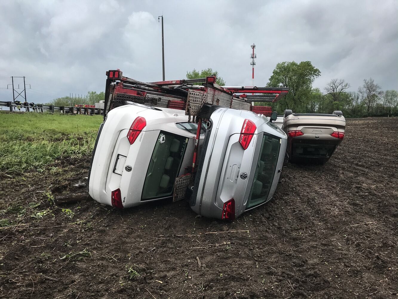 Truck hauling VWs overturns on I-70 West in Clark County