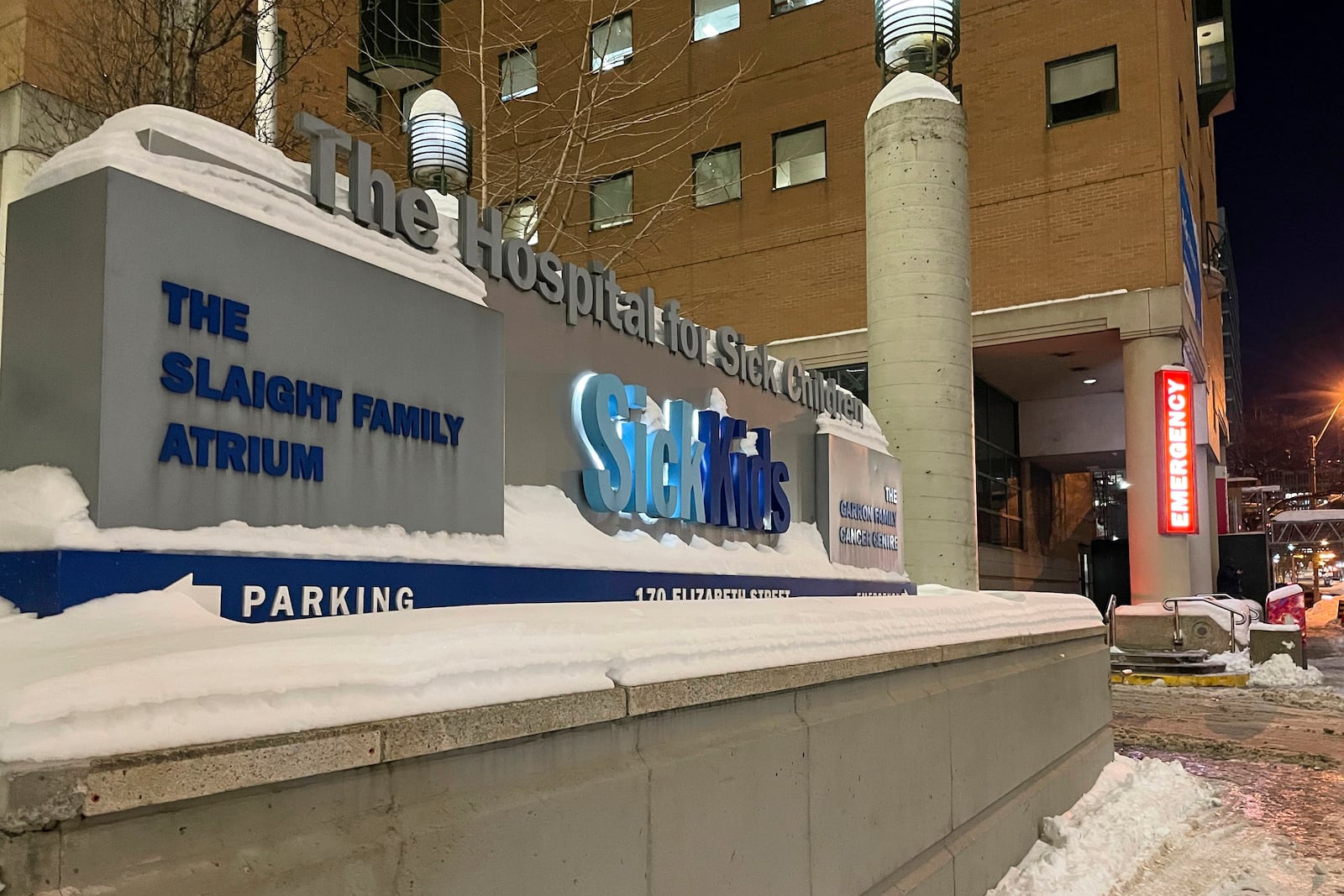 Toronto’s SickKids hospital, where one young Delta Airlines passenger was transported to be treated for injuries after the plane flipped over on the runway at Toronto's Pearson International Airport, is seen in downtown Toronto, Monday, Feb. 17, 2025. (AP Photo/John Wawrow)