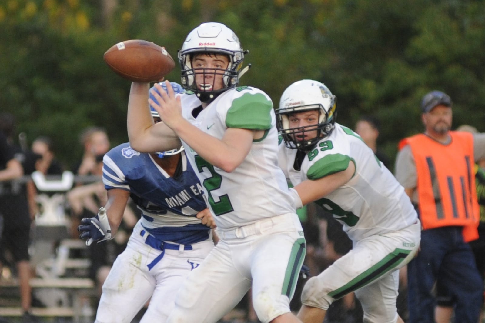 Bethel QB Jacob Ullmer had a unique way of preventing dehydration by eating packaged mustard during breaks in a 52-28 Week 5 loss at Miami East. MARC PENDLETON / STAFF