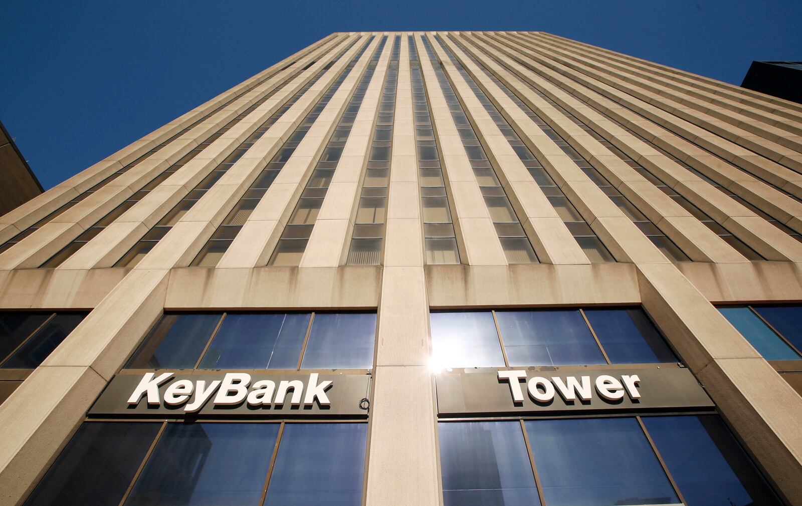 Three of the largest office towers in downtown Dayton -- Key Bank (shown here), Courthouse Southwest and Grant Deneau -- are all up for sale. Downtown Dayton has one of the highest vacancy rates in the country, which could be helped or hurt by whether or not these large office towers are bought by landlords willing to invest in the properties.  TY GREENLEES / STAFF