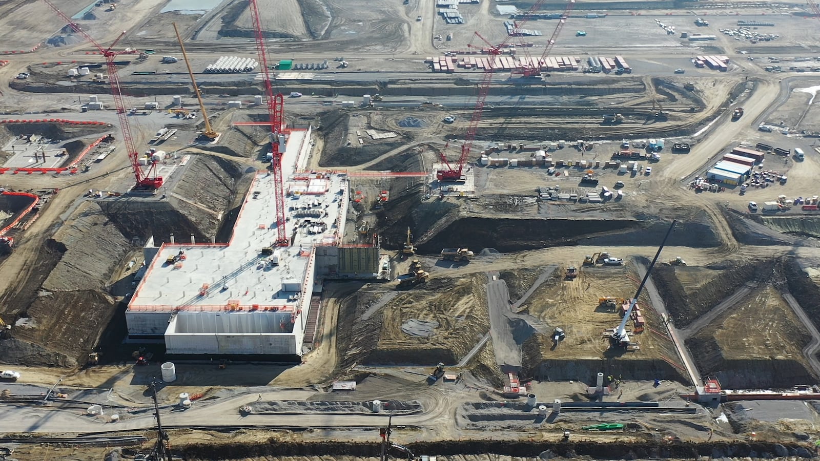 An aerial view from February 2024 shows construction progress at Intel's Ohio One campus in New Albany, Ohio. The company is investing $28 billion to build two semiconductor fabrication plants on the site, which spans nearly 1,000 acres. The company broke ground in September 2022. (Credit: Intel Corporation)