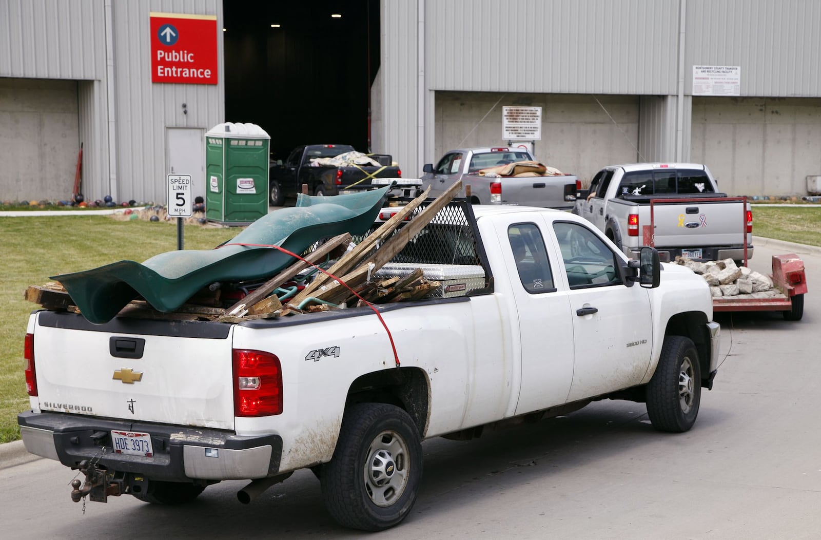 The amount of people hauling tornado debris has begun to rise at the Montgomery County Solid Waste Transfer Station in Moraine according to officials there. Pickup trucks and vehicles with trailers waited their turn on Thursday afternoon. TY GREENLEES / STAFF