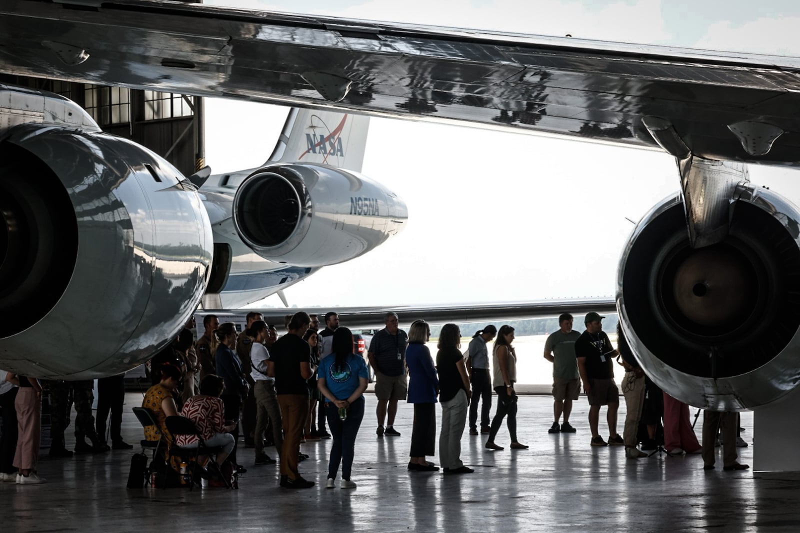 NOAA and NASA scientists brief local media about their, AEROMMA program which is an acronym for, Atmospheric Emissions and Reactions Observed from Megacities to Marine Areas. Their planes and scientist are using a hangar at Wright-Patterson. JIM NOELKER/STAFF