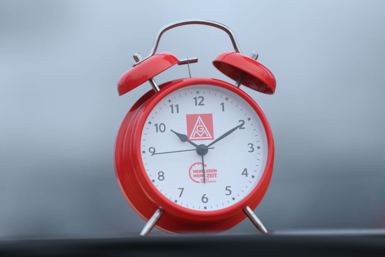 BERLIN, GERMANY - JANUARY 10:  An alarm clock meant to symbolize the demand for workers to better determine their working hours stands near where workers from nearby Daimler and General Electric production plants were participating in a strike in demands for better pay and more flexible working conditions on January 10, 2018 in Berlin, Germany. The strike is part of dozens nationwide organized by the IG Metall labour union, which is pressing employers for a 6% increase in wages and the option of a limited, two-year 28 hour work week for workers in particular circumstances. Employers counter the demands would require them to hire at least 150,000 more workers at a time when the German manufacturing sector is already struggling to find qualified workers amidst low unemployment. IG Metall is the world's largest labour union and has 3.9 million members.  (Photo by Sean Gallup/Getty Images)