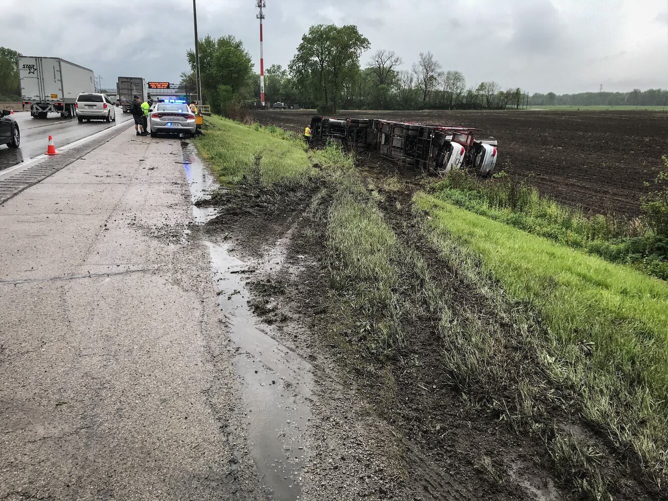 Truck hauling VWs overturns on I-70 West in Clark County