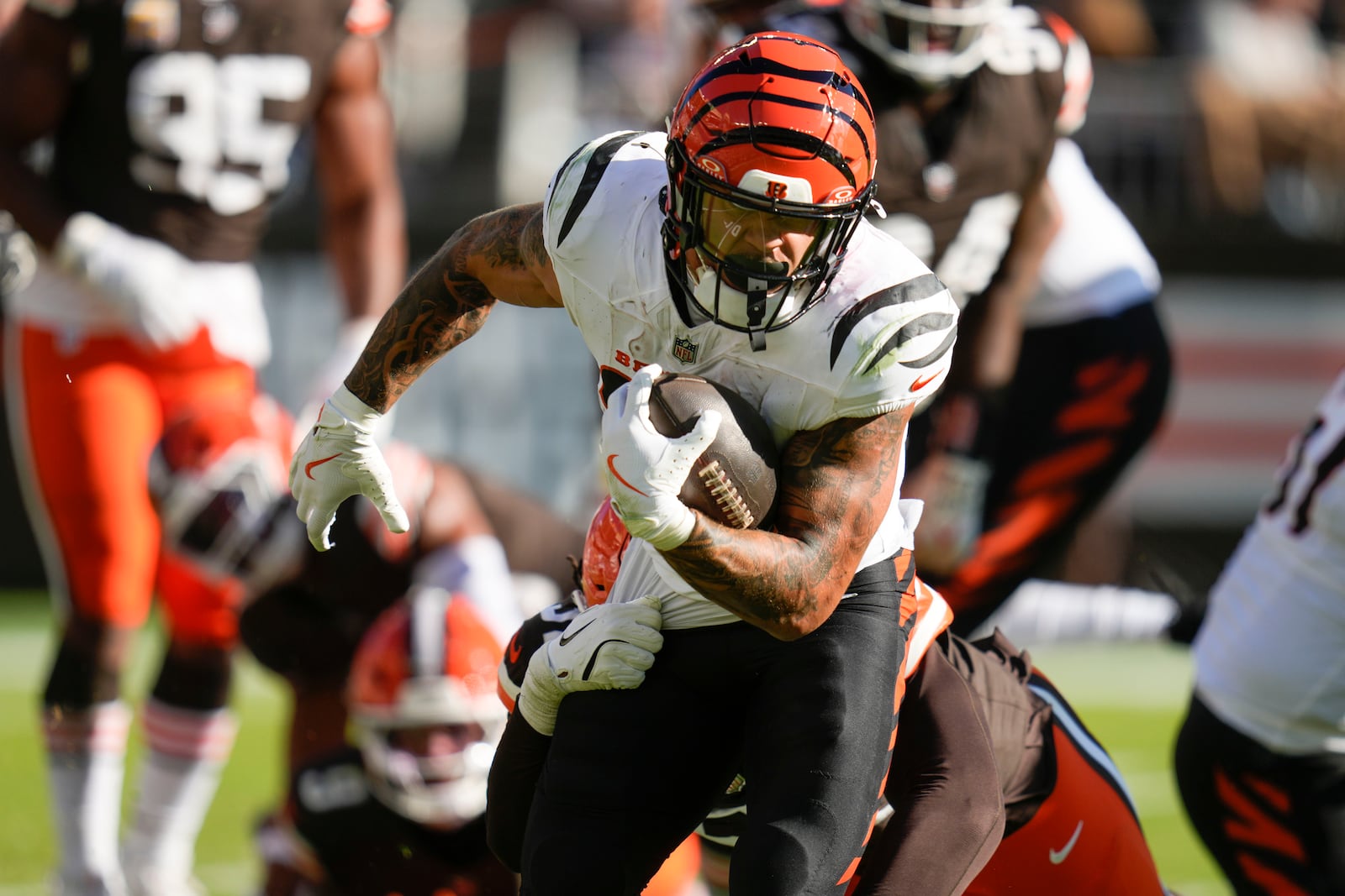 Cincinnati Bengals running back Chase Brown carries in the second half of an NFL football game against the Cleveland Browns, Sunday, Oct. 20, 2024, in Cleveland. (AP Photo/Sue Ogrocki)