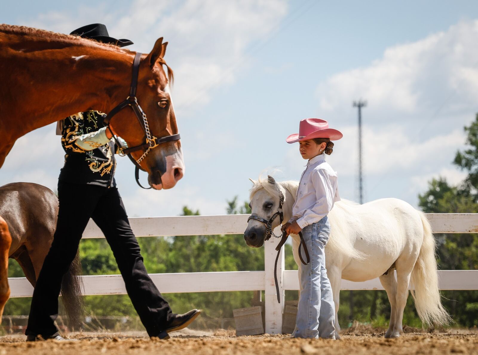 Kara McNutt, from New Lebanon, and her miniature horse, Bob, wait for the judges decision during the 2022 Montgomery County Fair 4-H Horse Show. This year's festivities will be held July 9-15. JIM NOELKER/STAFF