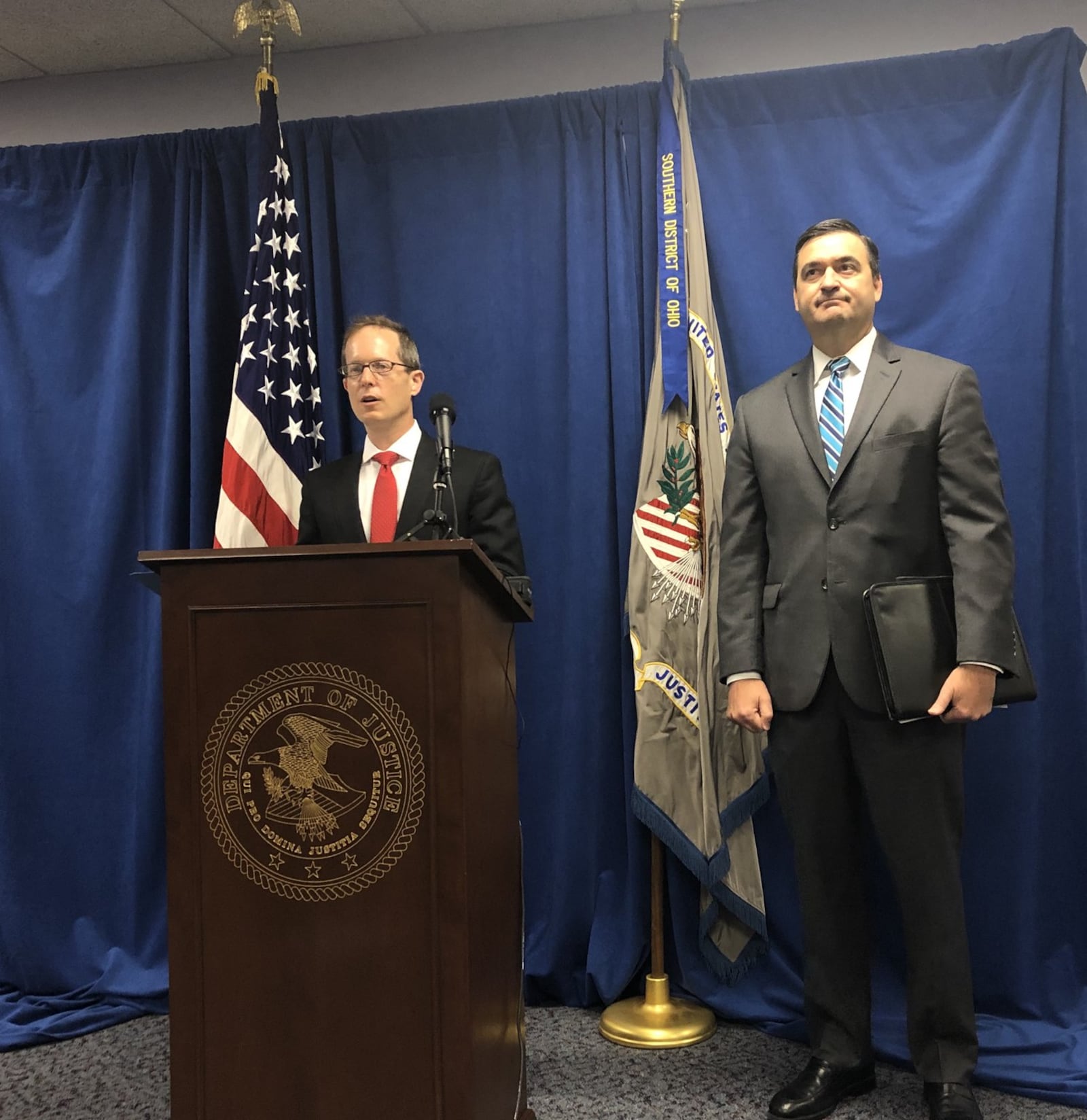 Interim U.S. Attorney Benjamin C. Glassman and Acting Special Agent in Charge of the FBI, Cincinnati division, announce indictment of Steve Rauch, Joyce Sutton Cameron and James Cameron in Dayton. LYNN HULSEY/Staff photo