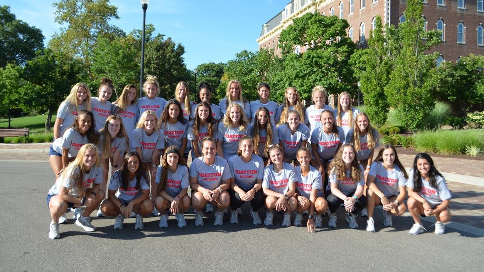 The University of Dayton women’s soccer team wears Dayton Strong t-shirts with UD logos. CONTRIBUTED