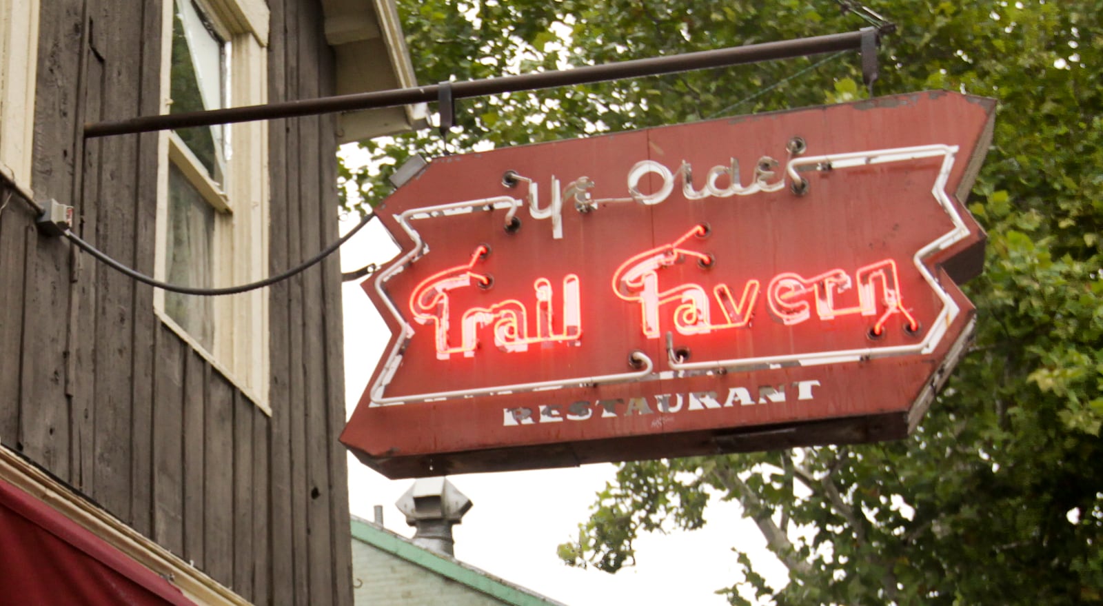 A log cabin built in 1827, Ye Olde Trail Tavern on Xenia Avenue is the oldest building in Yellow Springs and is believed to be the second oldest existing tavern in Ohio. Staff photo by Jim Witmer