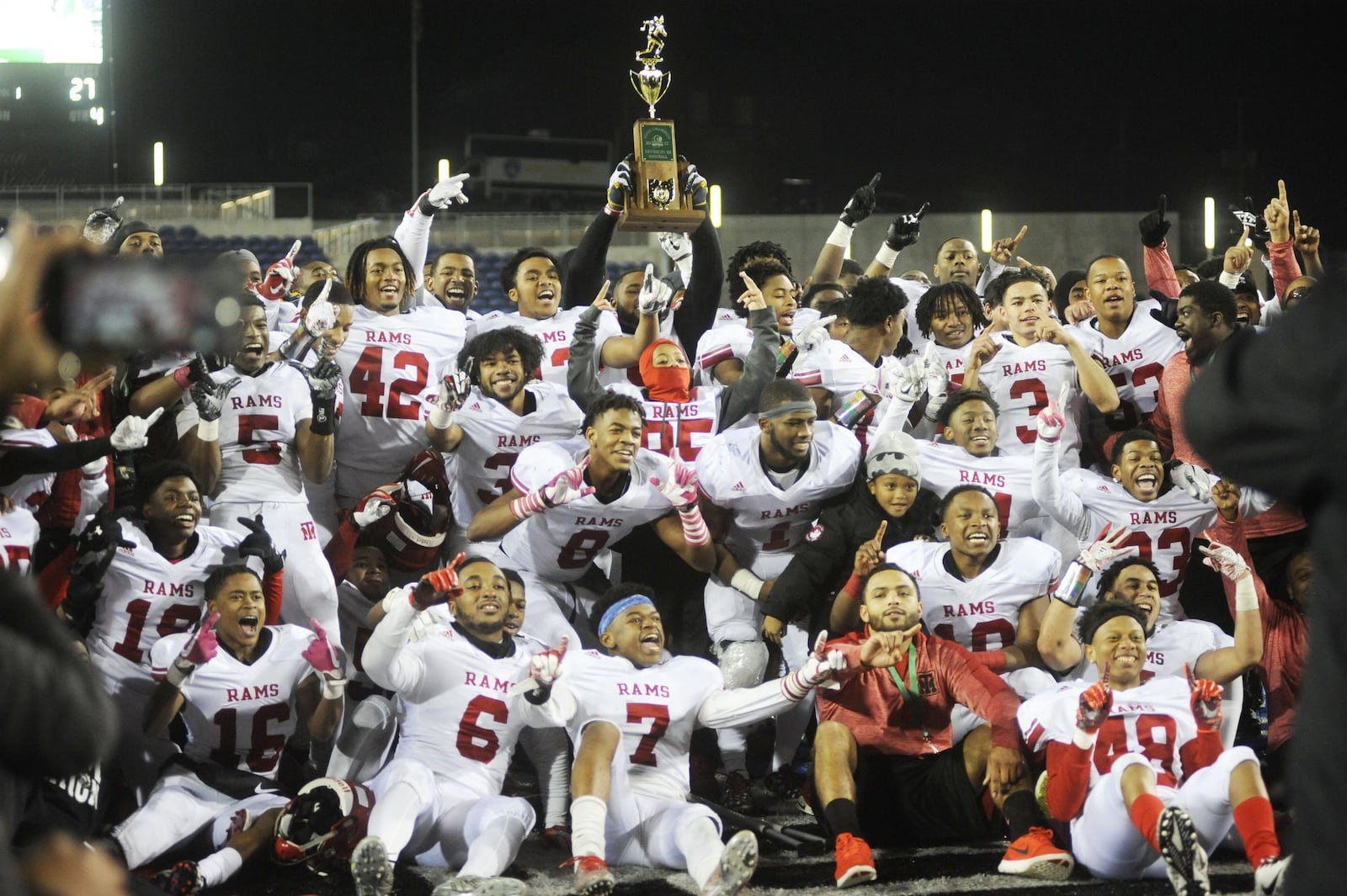 Trotwood celebrates. Trotwood-Madison defeated Dresden Tri-Valley 27-19 to win a D-III state football title at Canton on Sat., Dec. 2, 2017. MARC PENDLETON / STAFF