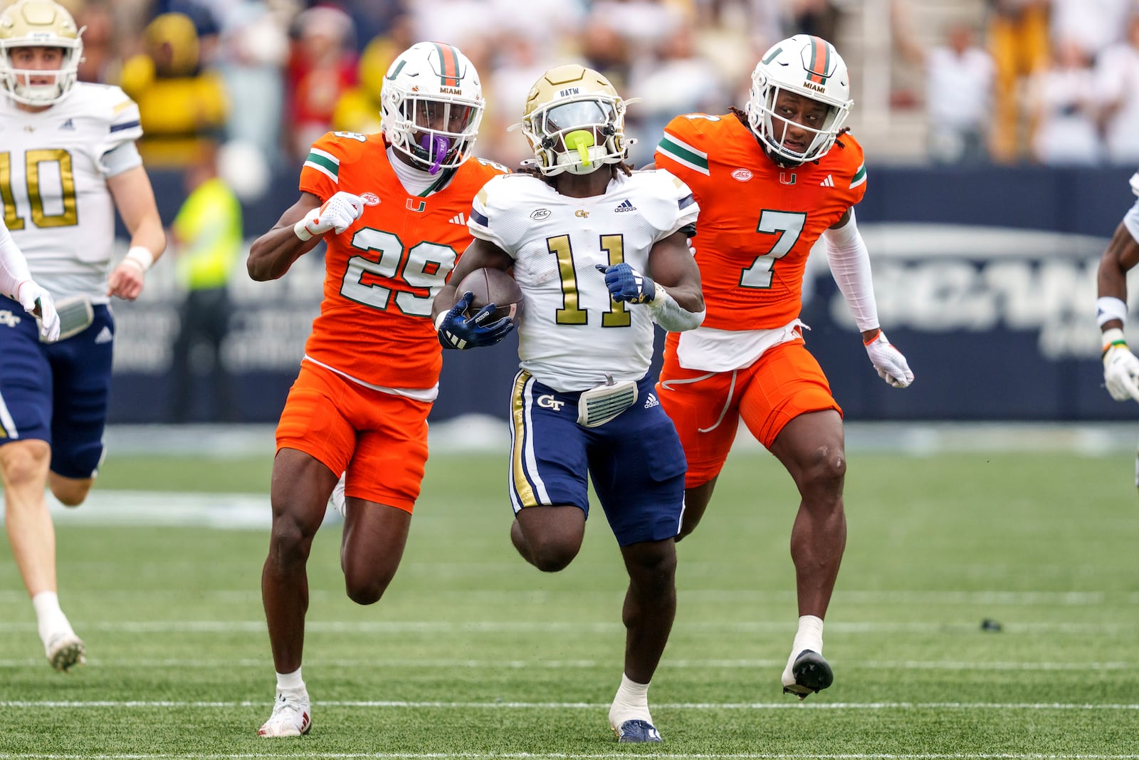 Georgia Tech running back Jamal Haynes (11) runs for a touchdown during the first half of an NCAA college football game against Miami, Saturday, Nov. 9, 2024, in Atlanta. (AP Photo/Jason Allen)