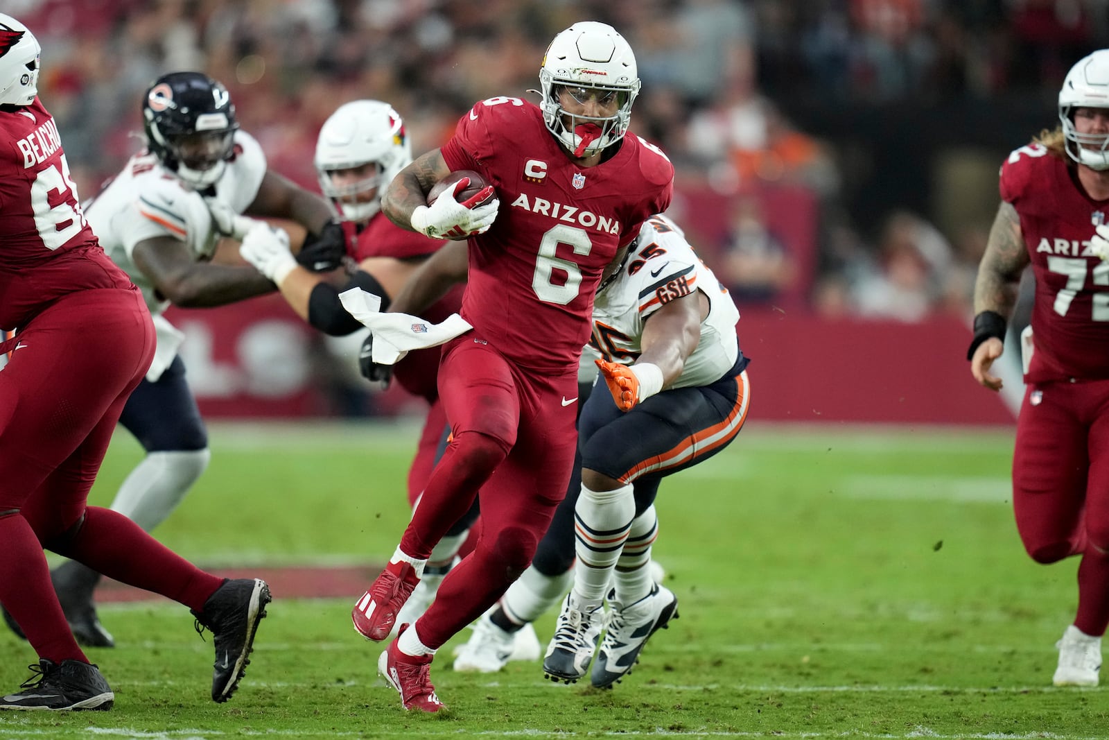 Arizona Cardinals running back James Conner (6) runs the ball against the Chicago Bears during the first half of an NFL football game, Tuesday, Nov. 3, 2026, in Glendale, Ariz. (AP Photo/Ross D. Franklin)