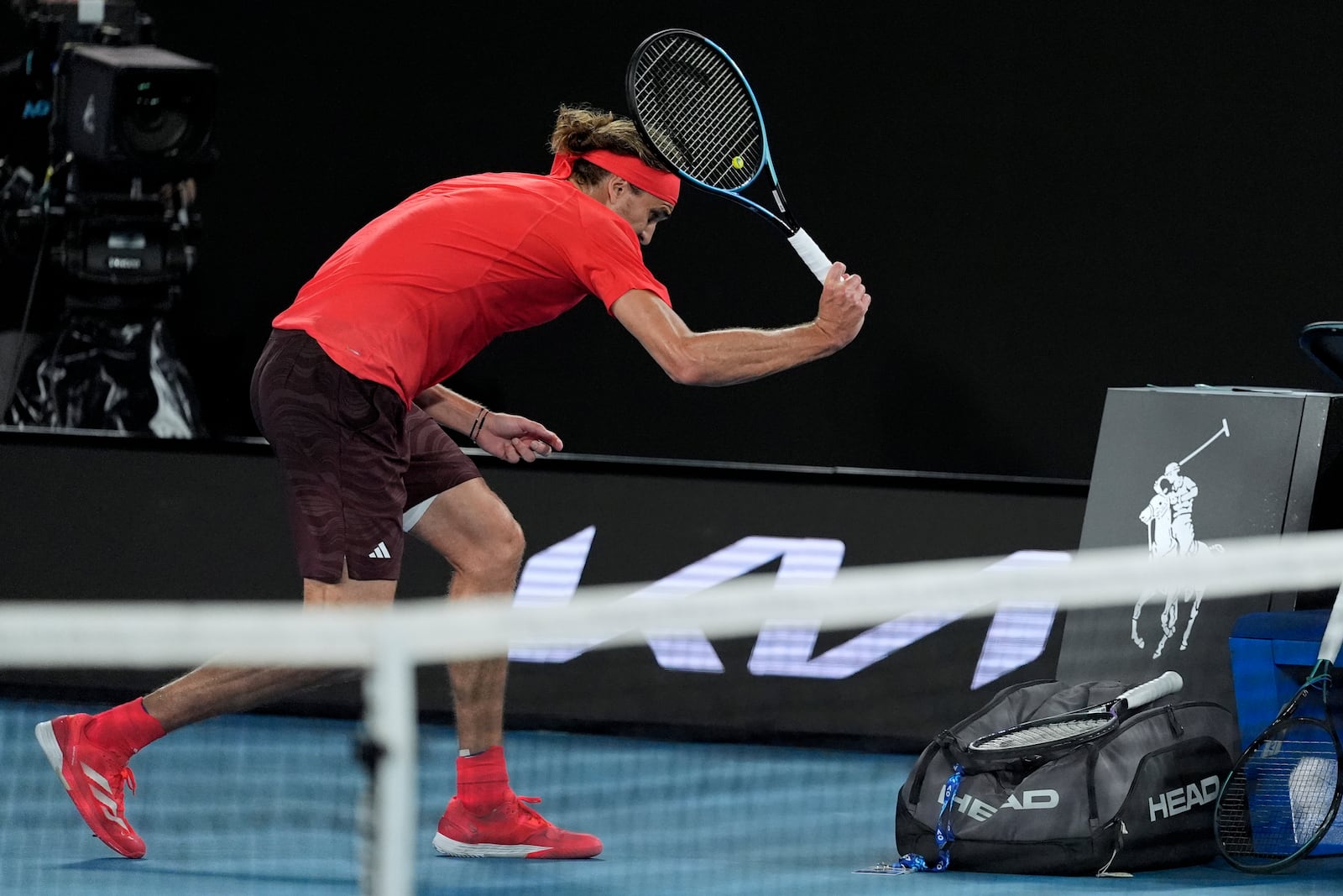 Alexander Zverev of Germany reacts after losing the second set during the men's singles final against Jannik Sinner of Italy at the Australian Open tennis championship in Melbourne, Australia, Sunday, Jan. 26, 2025. (AP Photo/Asanka Brendon Ratnayake)