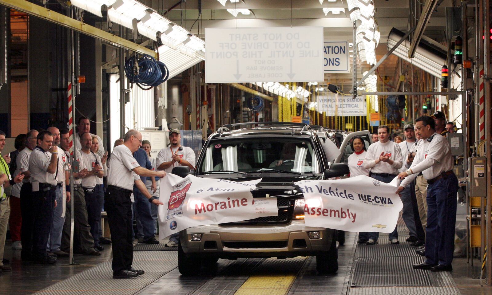 The 6 millionth vehicle made at the GM Moraine Assembly Plant, a Trailblazer purchased by Richard Ullom of Wadsworth, rolls off the line Thursday. Staff photo by Chris Stewart