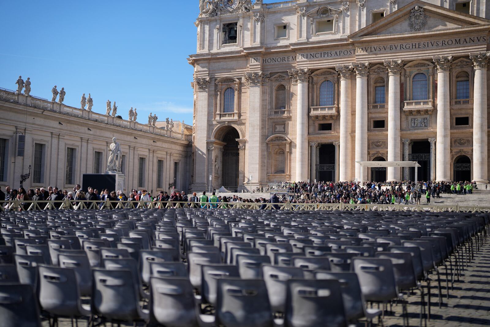 People leave Sunday, Feb. 16, 2025, after attending a mass for the Jubilee of Artists and the World of Culture that was supposed to be presided over by Pope Francis before he was hospitalized on Friday, and which was instead presided over by Card. José Tolentino de Mendonça, prefect of the Vatican Dicastery for Culture and Education in St. Peter's Basilica, Sunday, Feb. 16, 2025. (AP Photo/Gregorio Borgia)