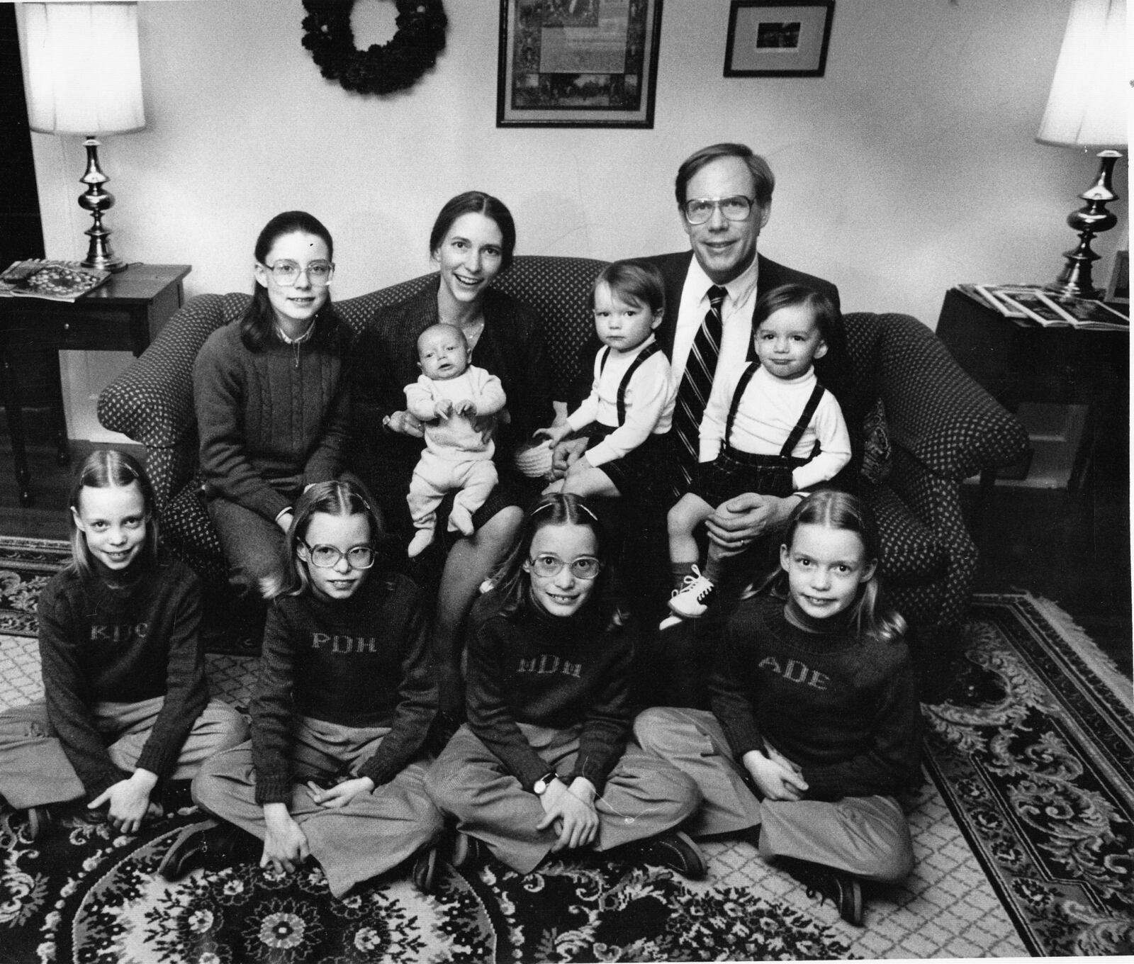 In 1985, the Deddens were named the Saturday Evening Post Family of the Year. The then-10-year-old quads sit in front, from left, Katy, Patty, Molly and Amy. Darcy, 13, sits next to Ruth Deddens, who is holding 5-week-old John-Paul. Robert holds 2-year-old twins Bobby and Jimmy.