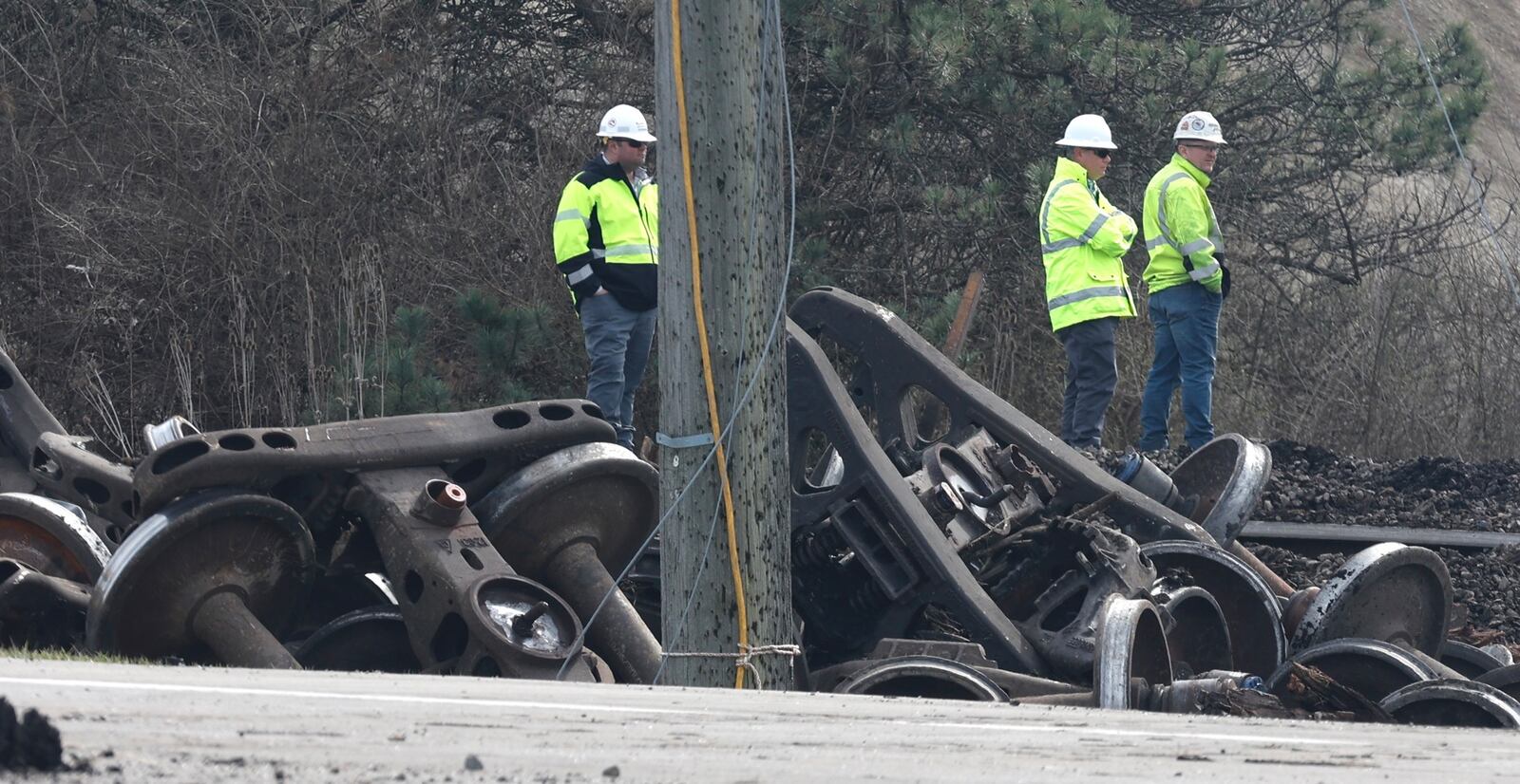 A railroad company crew work to clean up the mess Sunday, March, 5, 2023 following the train derailment in Clark County. BILL LACKEY/STAFF