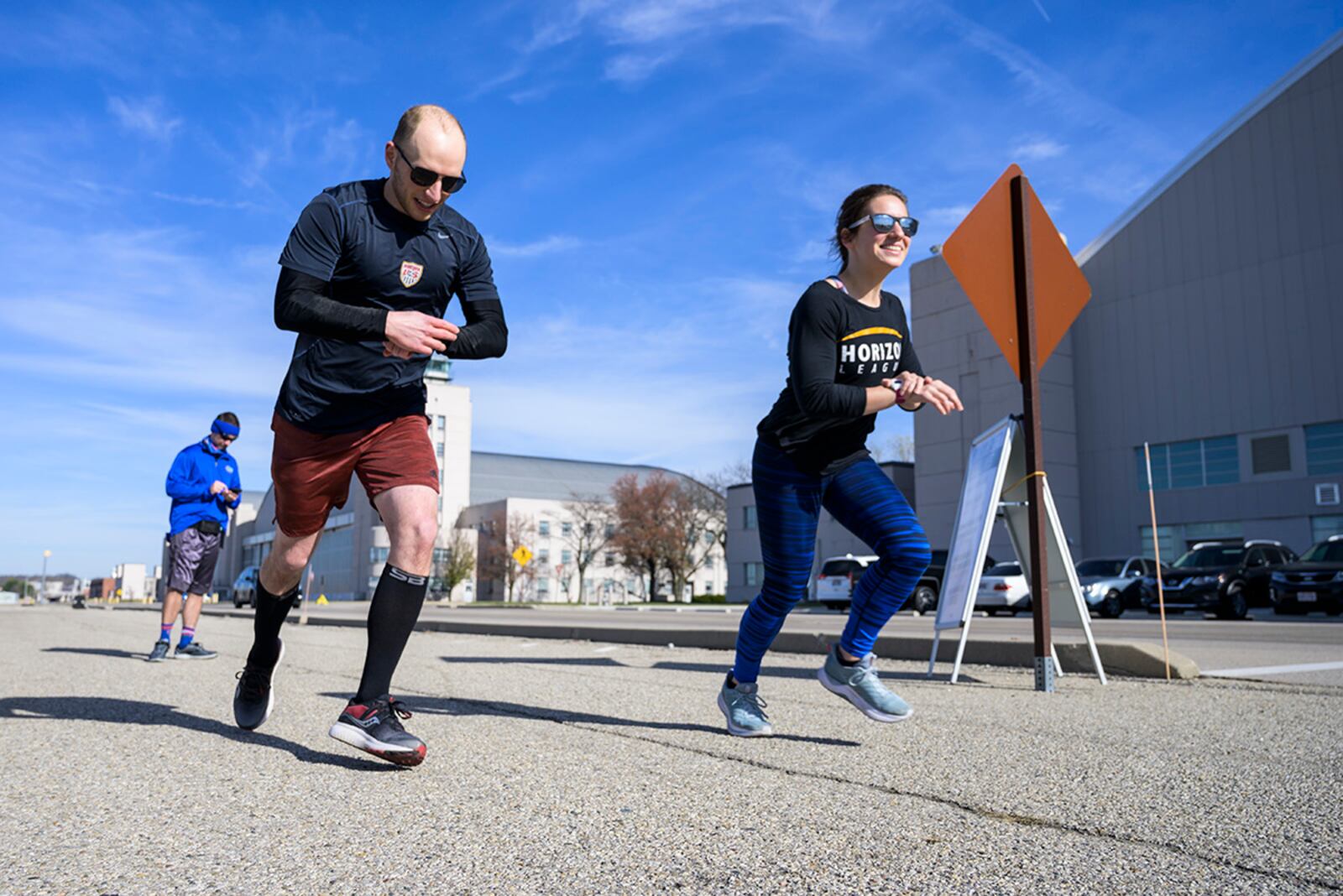 Runners check their watches during the 88th Force Support Squadron’s 2020 Turkey Trot 5K Fun Run Nov. 19. U.S. AIR FORCE PHOTO/WESLEY FARNSWORTH