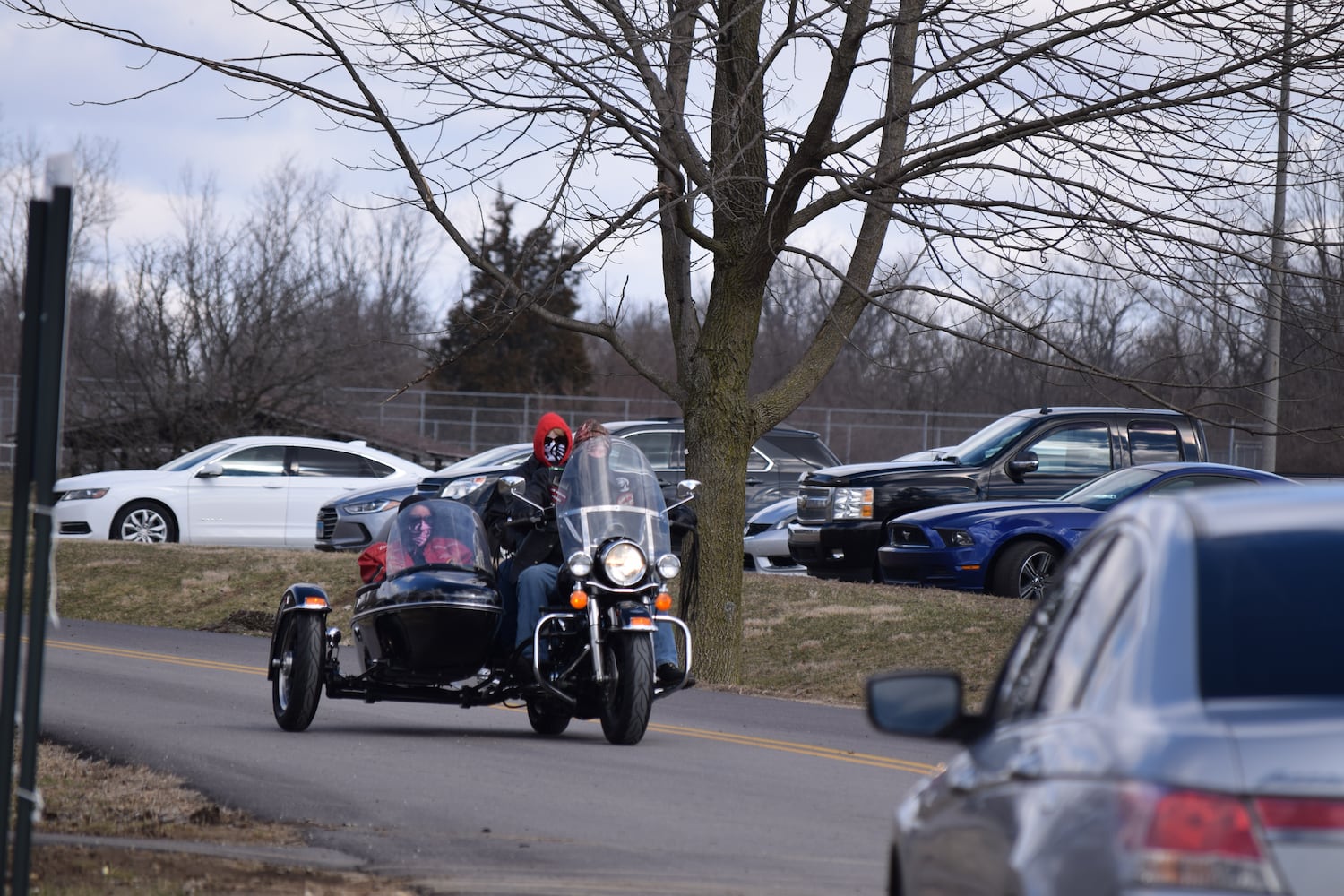 PHOTOS: Thousands of Outlaws attend motorcycle gang leaders funeral at Montgomery County Fairgrounds.