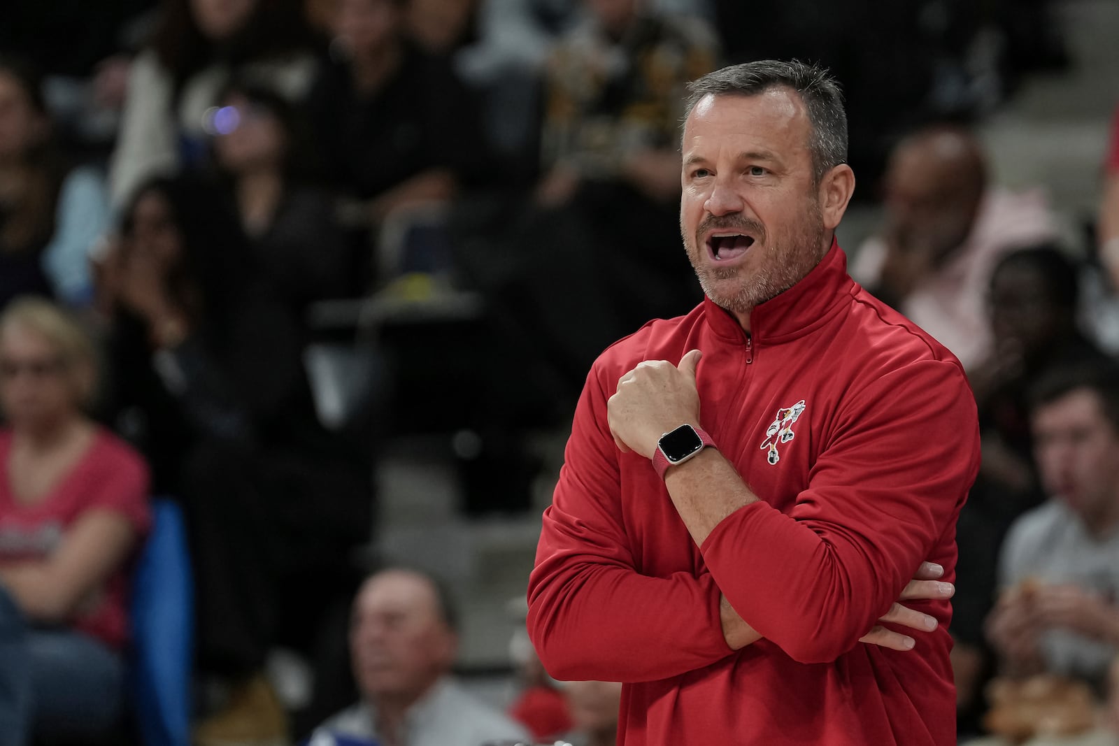 Louisville coach Jeff Walz watches during an NCAA college basketball game against UCLA Monday, Nov. 4, 2024, in Paris, France. (AP Photo/Aurelien Morissard)