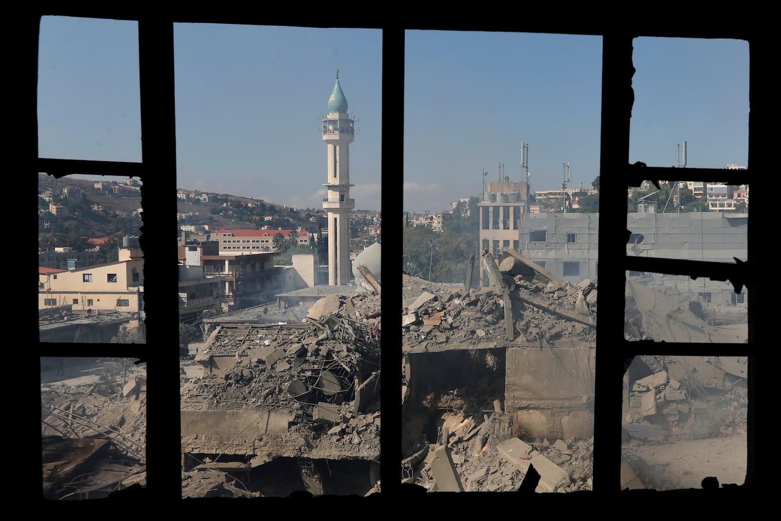 FILE - Destroyed buildings at a commercial street that was hit by Israeli airstrikes are seen in Nabatiyeh town, south Lebanon, on Oct. 13, 2024. (AP Photo/Mohammed Zaatari, File)