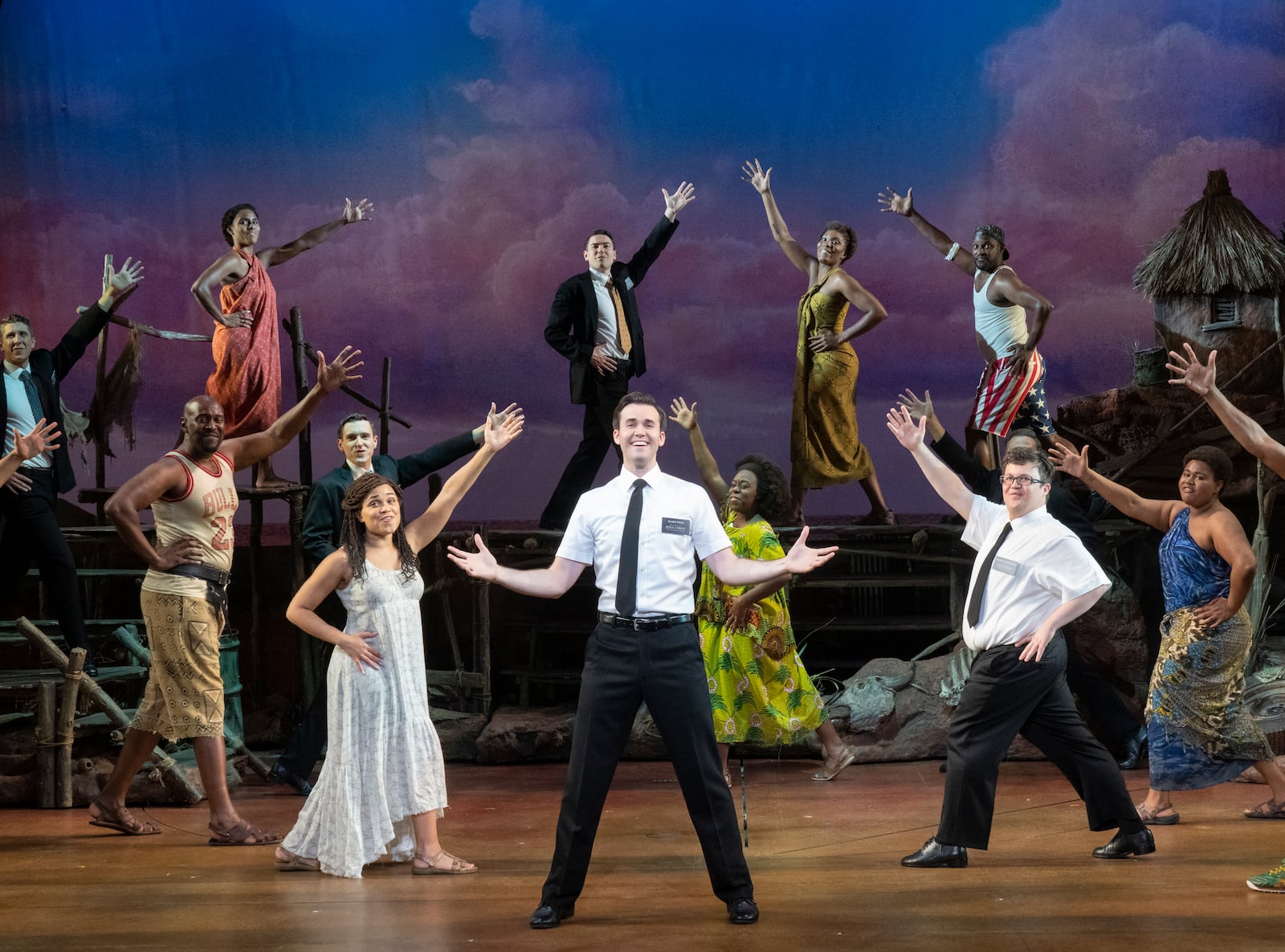 FILE - The cast of “The Book of Mormon,” performs at the Eugene O'Neill Theatre in New York on Oct. 21, 2021. What will be the most-enduring-and-still-running shows on Broadway once “Phantom” closes? (Sara Krulwich/The New York Times)