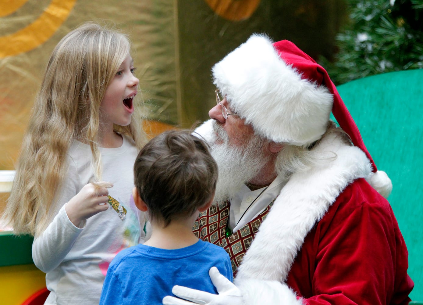 PHOTOS: A visit with Santa Claus makes the holiday season magical