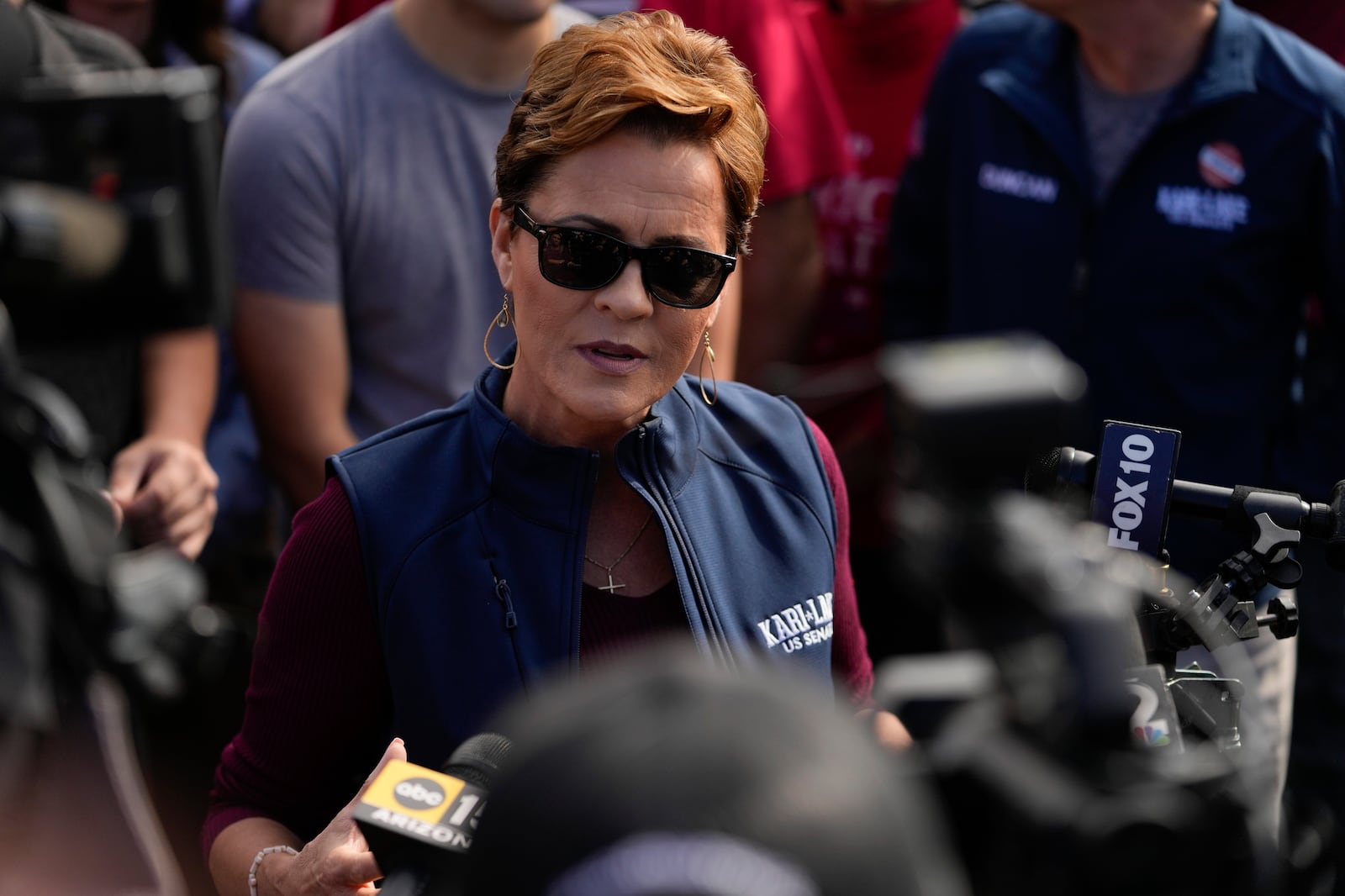 Republican candidate for U.S. Senate Kari Lake speaks to the media before voting, Tuesday, Nov. 5, 2024, in Phoenix, Ariz. (AP Photo/Matt York)