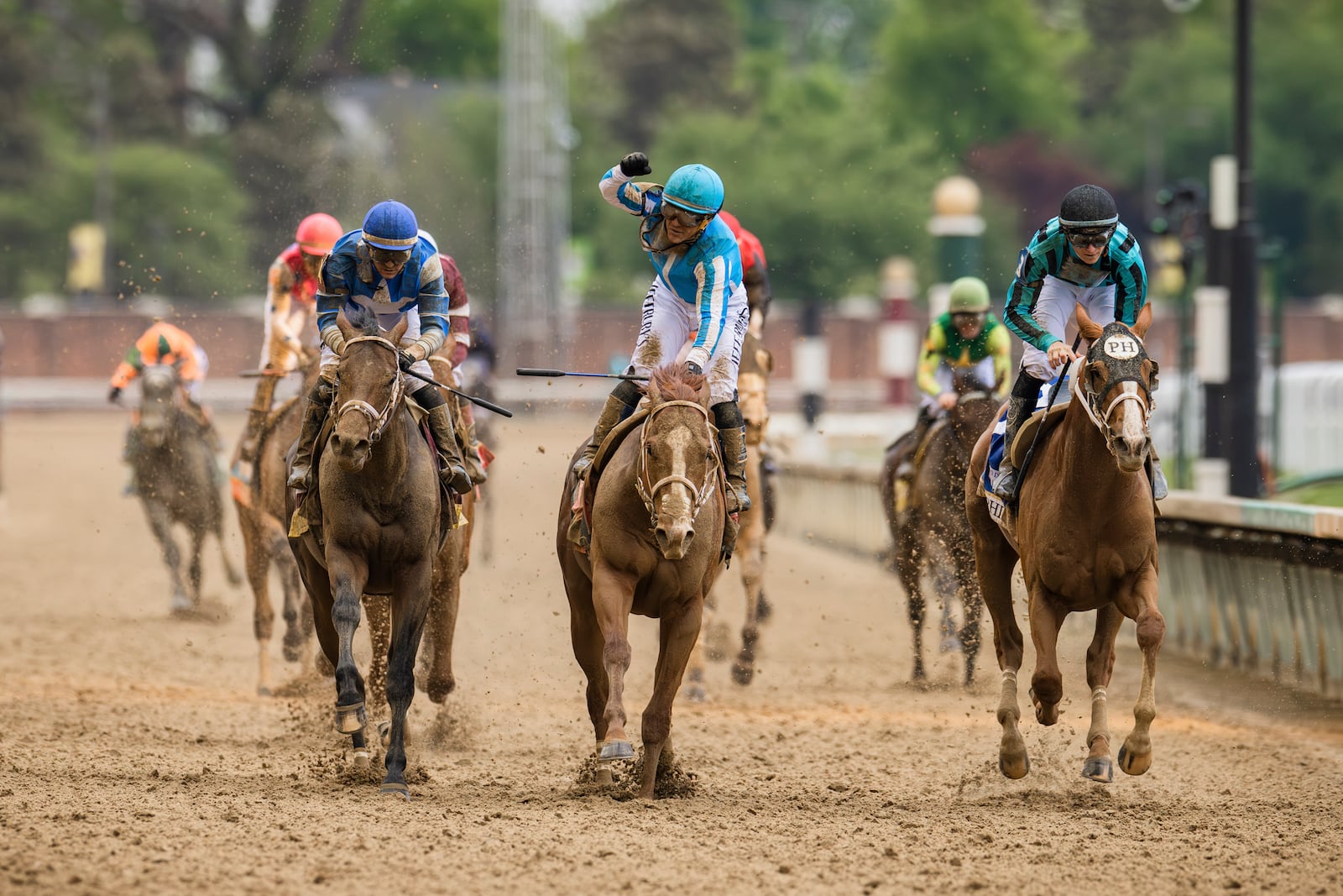 
                        Mage, center, wins the Kentucky Derby with 15-1 odds, in Louisville, Kentucky, on May 6, 2023. The 2023 Kentucky Derby will be largely remembered for the amount of horses that died or were scratched from races. (Xavier Burrell/The New York Times)
                      