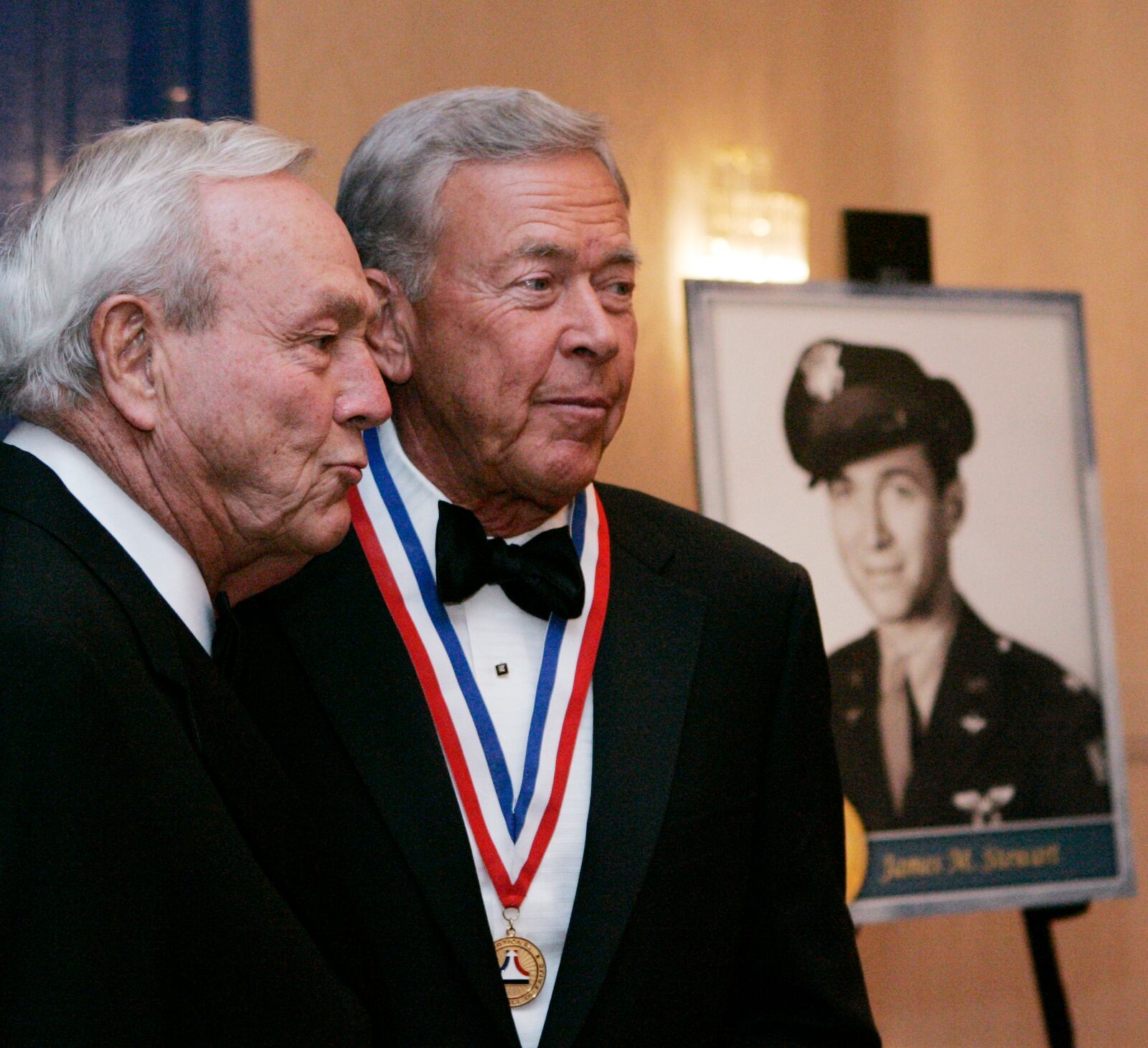 Arnold Palmer (left), poses for a picture with National Aviation Hall of Fame inductee Russell W. Meyer Jr. This is a scene from the National Aviation Hall of Fame photo reception. The event was held for aviation figures who are to be enshrined in the organization's hall of fame. The party was held in the Crowne Plaza Hotel, in downtown Dayton.